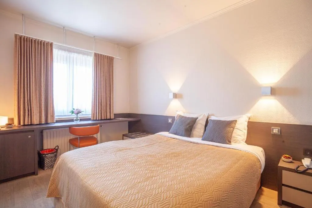 Bed in Hotel Monaco Zeebrugge Beach by Rikas Hotels