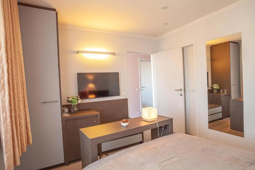 Bed in Hotel Monaco Zeebrugge Beach by Rikas Hotels