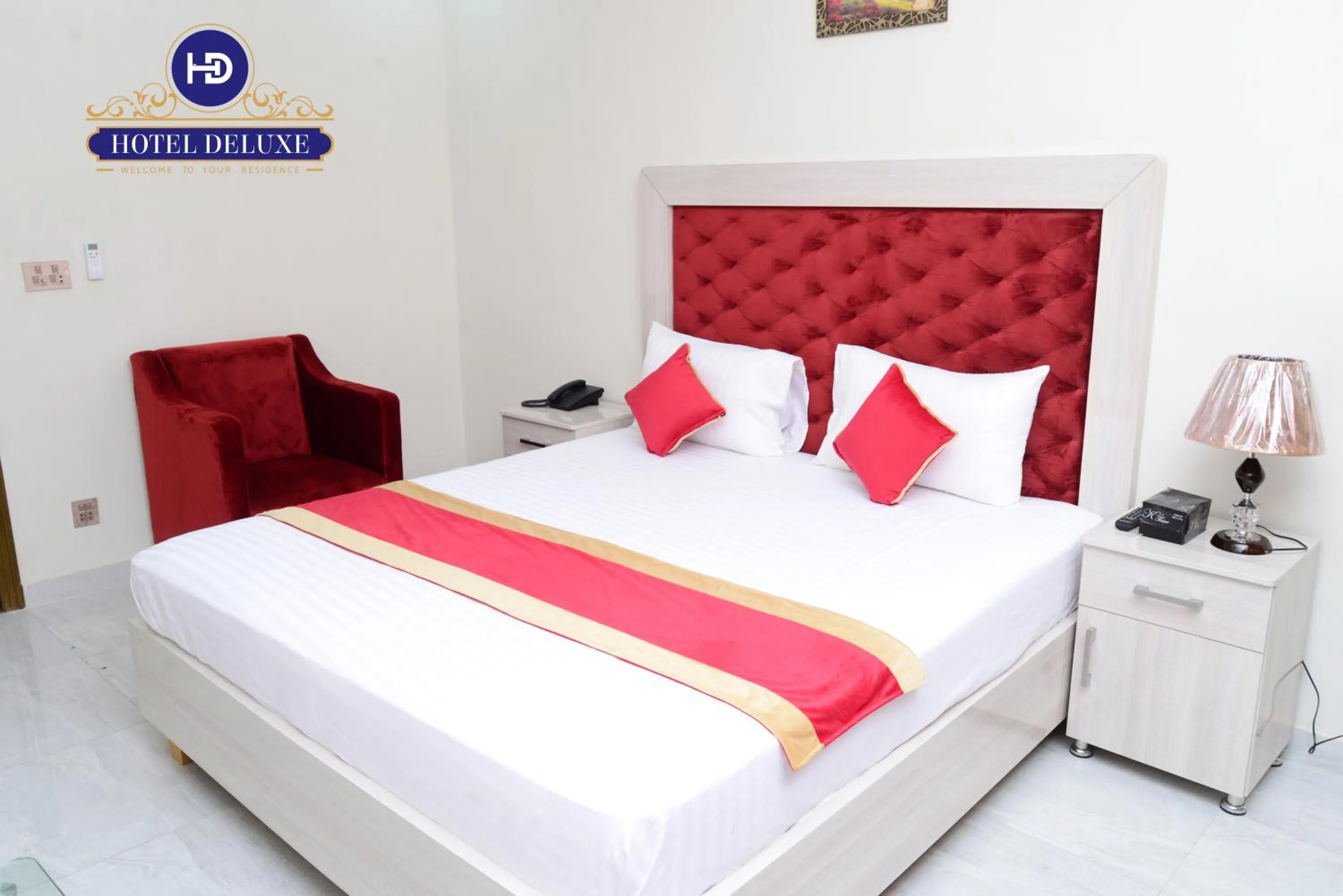 Bed in Hotel Deluxe Lahore