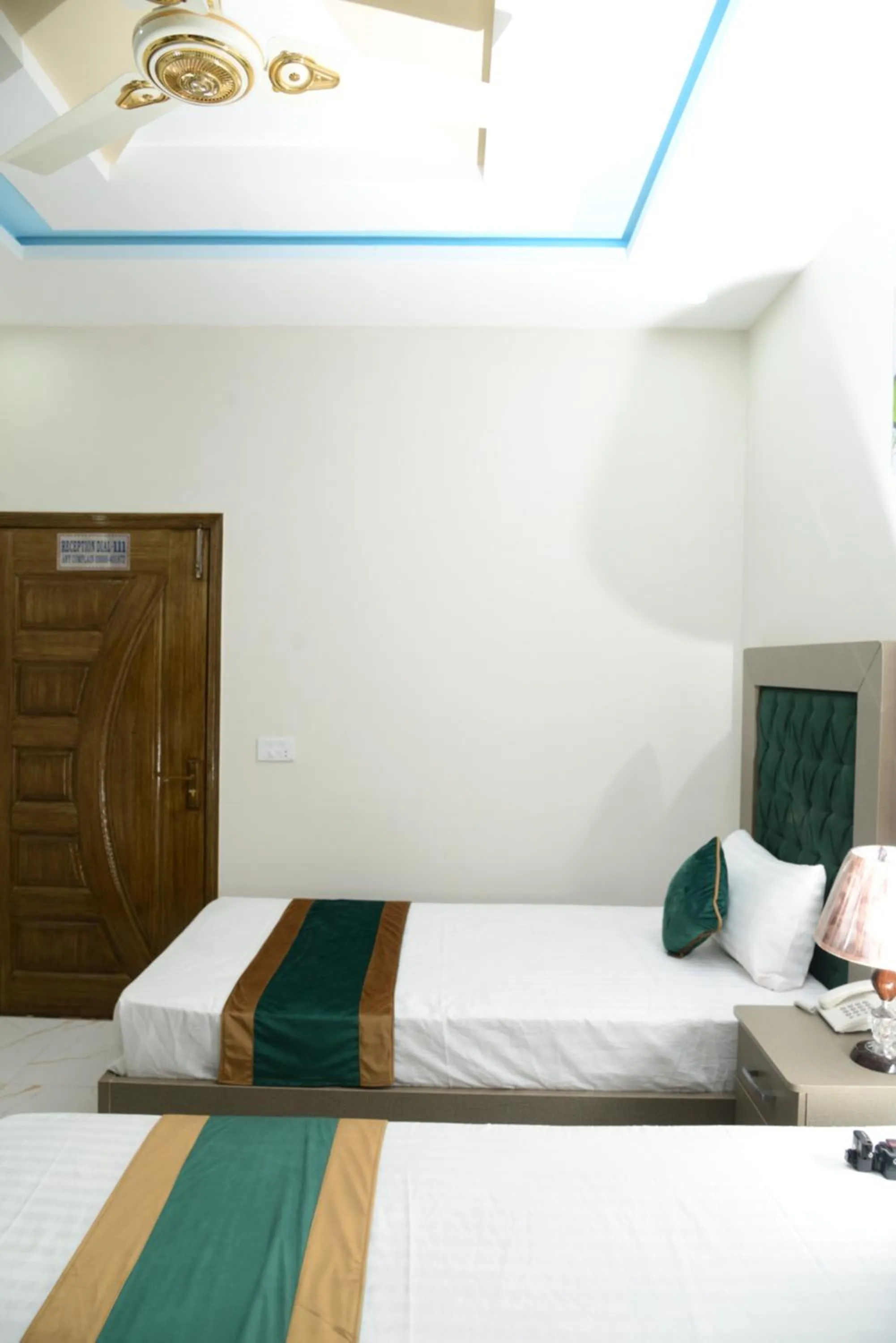 Bed in Hotel Deluxe Lahore