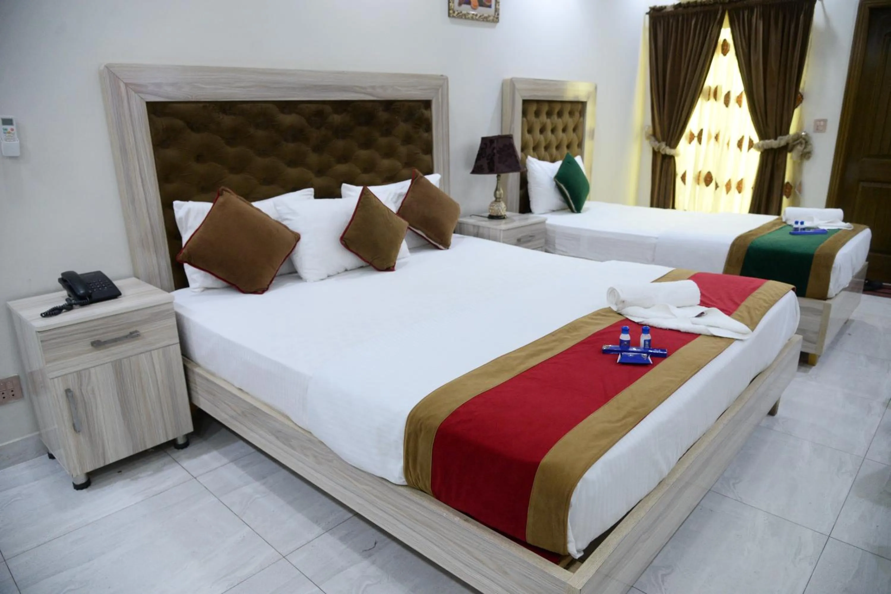 Bed in Hotel Deluxe Lahore