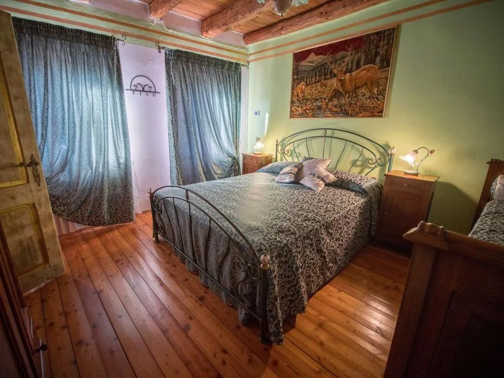 Bed in Antica Villa Sophie