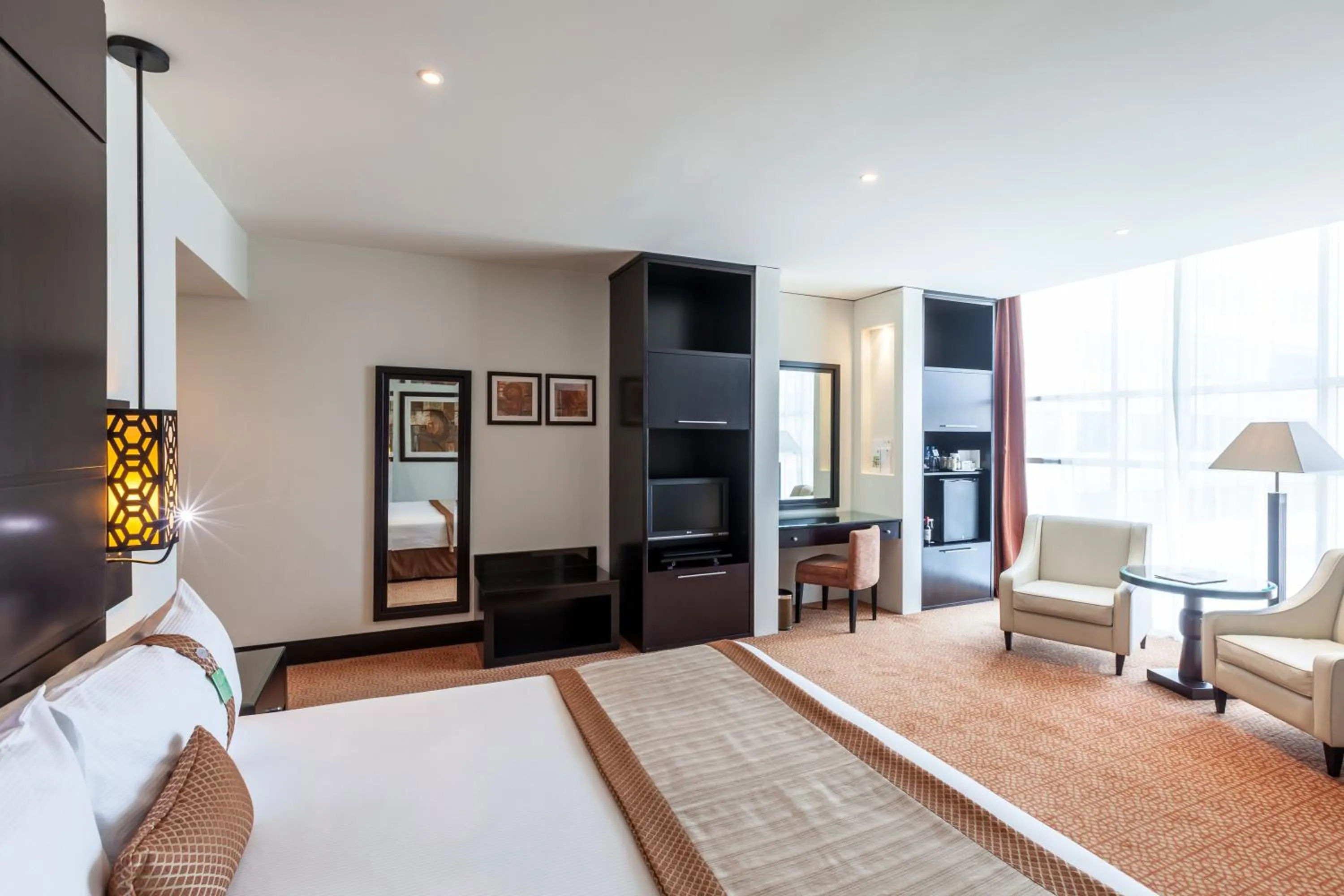 Photo of the whole room in Holiday Inn Dubai Al Barsha by IHG