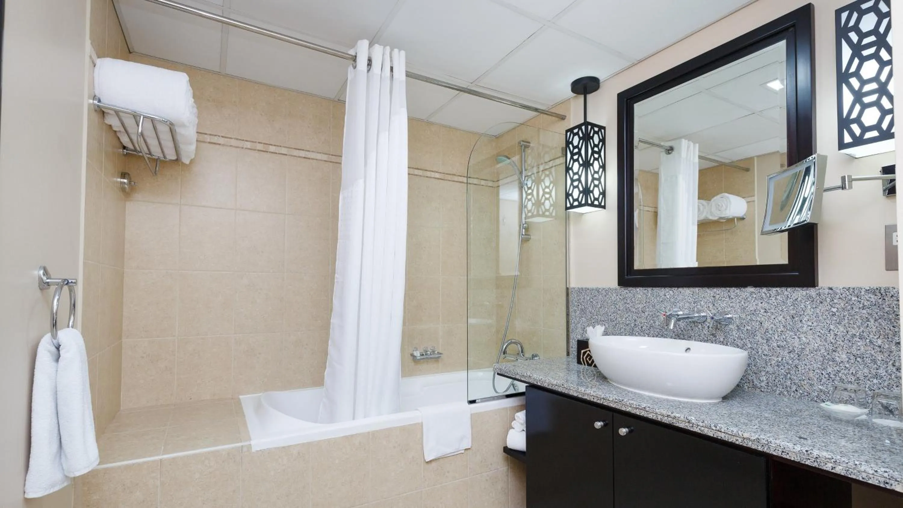 Bathroom in Holiday Inn Dubai Al Barsha by IHG