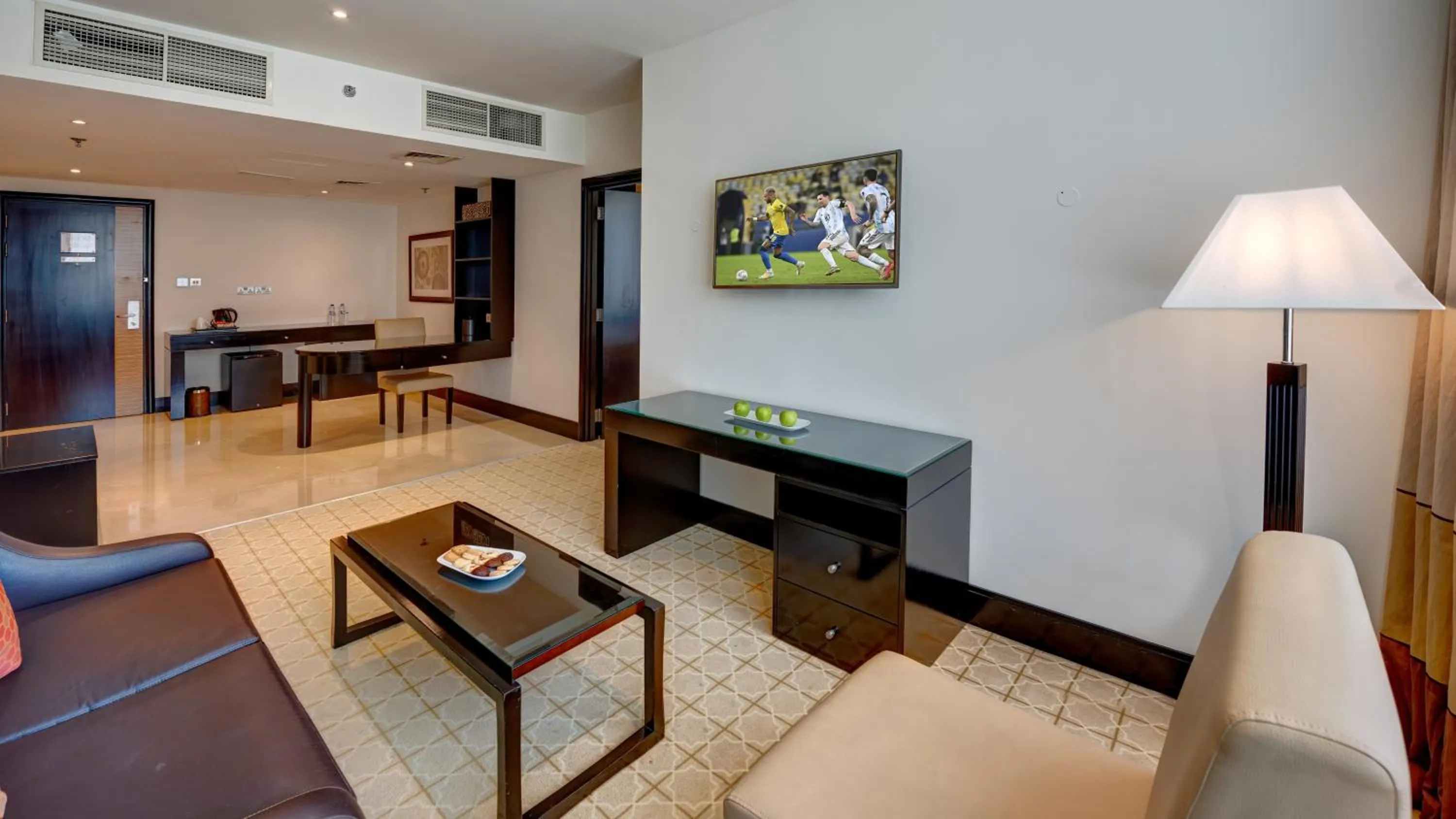 Living room in Holiday Inn Dubai Al Barsha by IHG