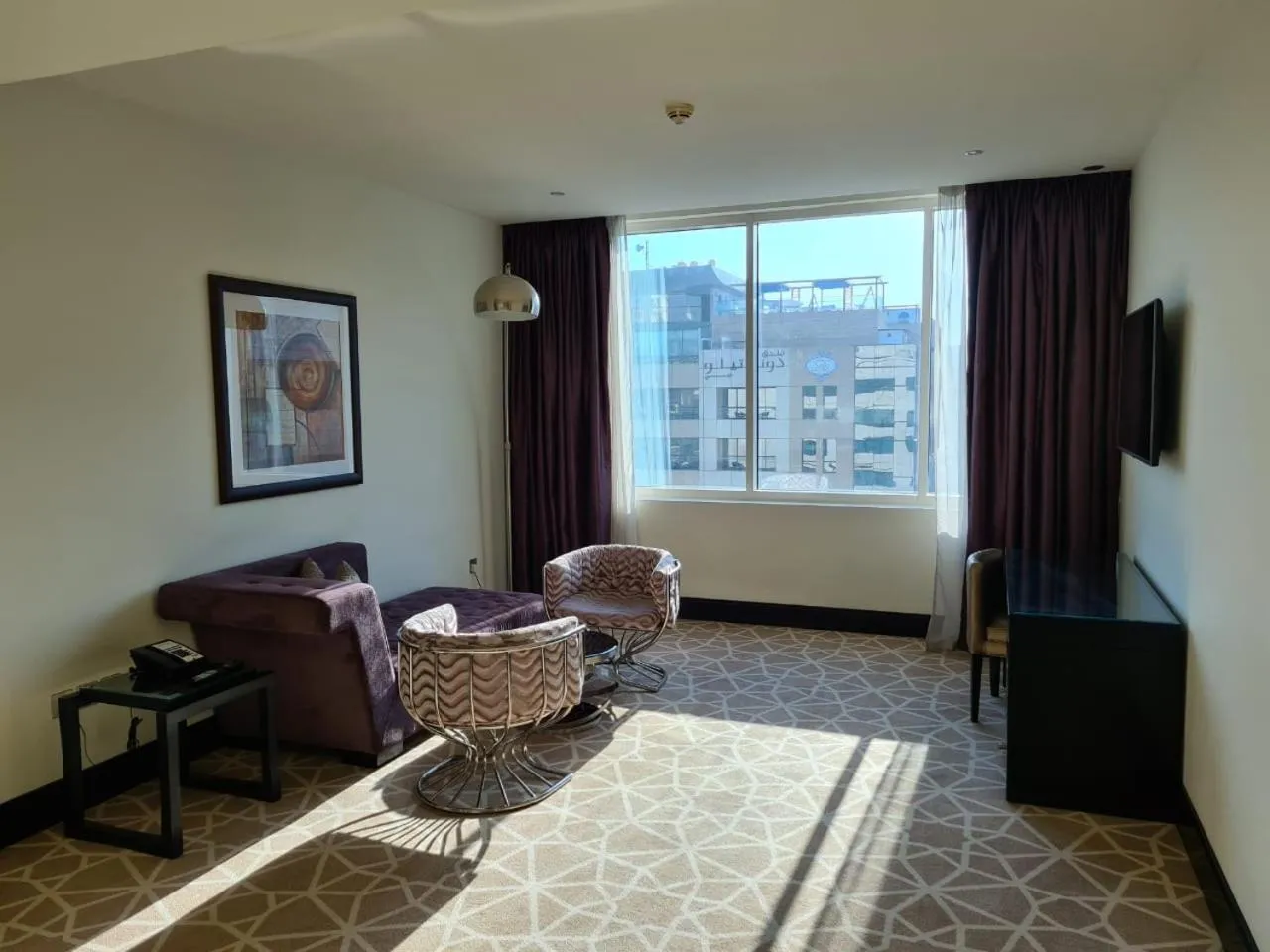 Living room in Holiday Inn Dubai Al Barsha by IHG