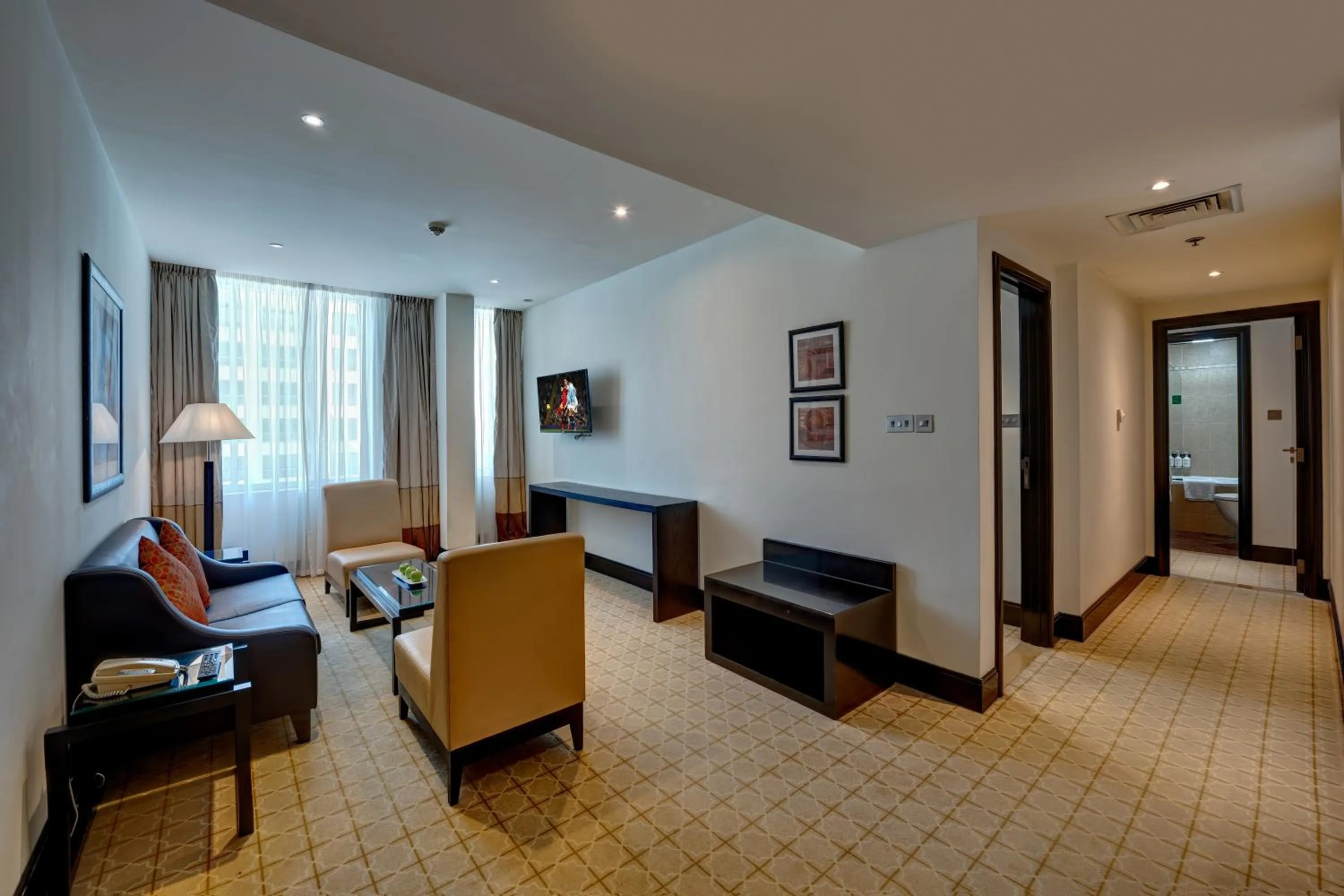 Living room in Holiday Inn Dubai Al Barsha by IHG