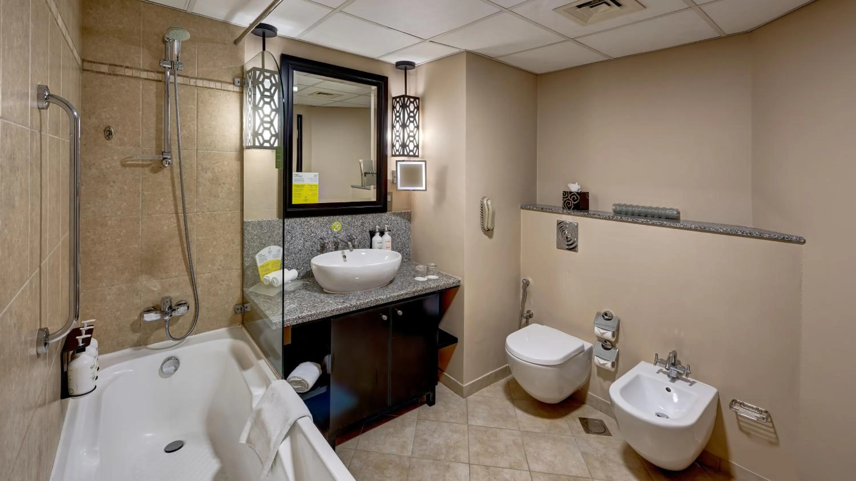 Bathroom in Holiday Inn Dubai Al Barsha by IHG
