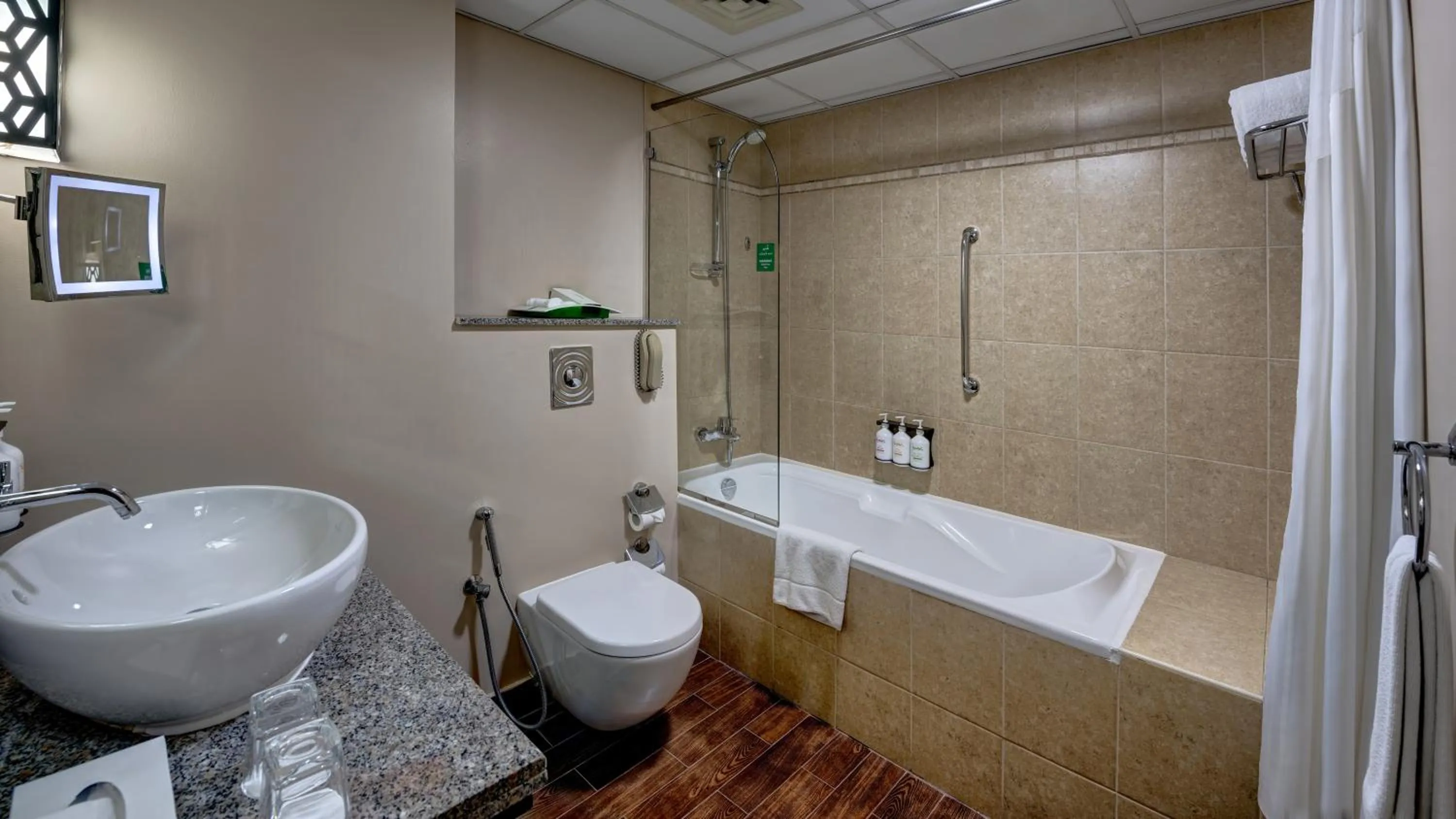 Bathroom in Holiday Inn Dubai Al Barsha by IHG