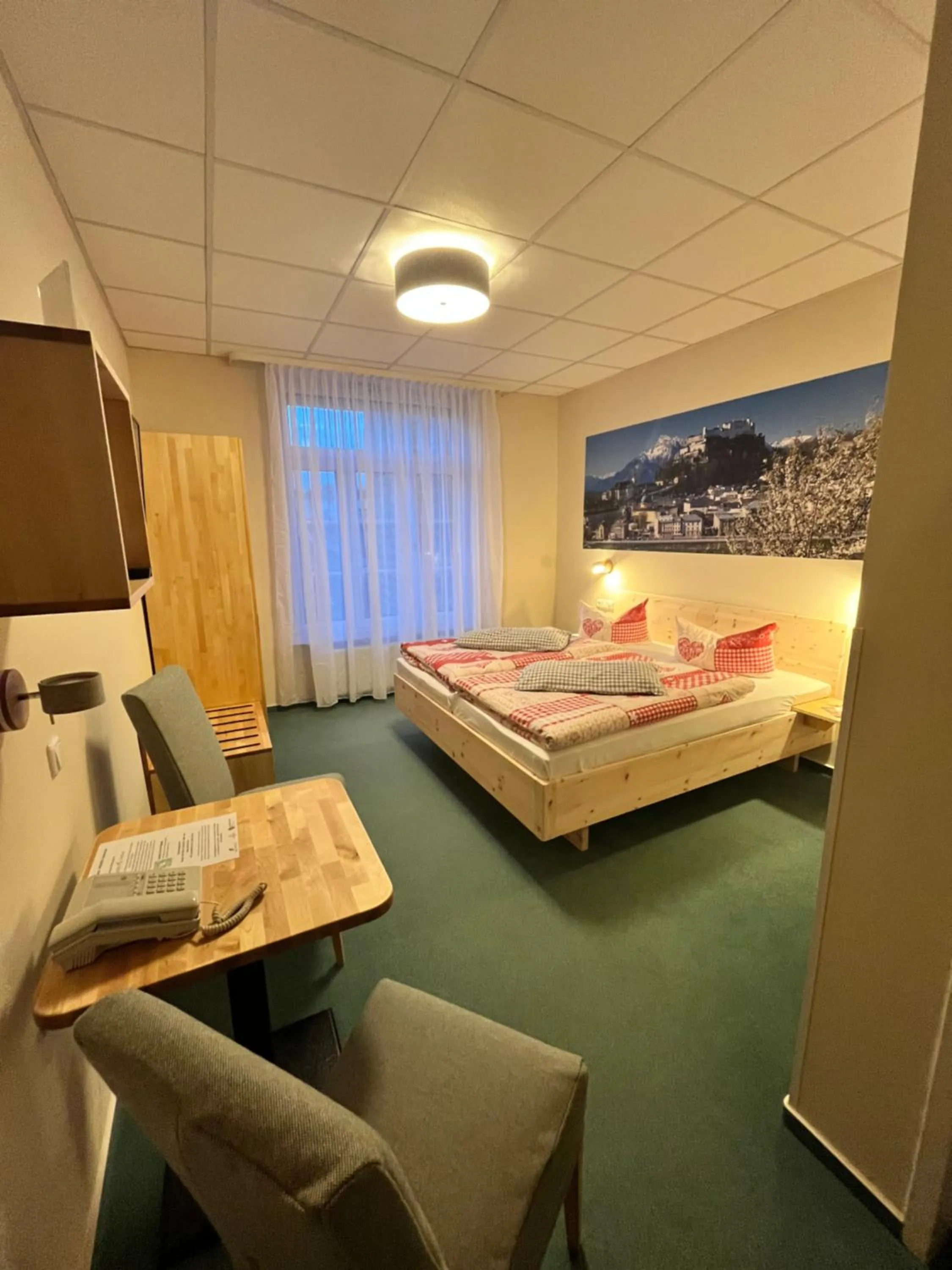 Photo of the whole room, Bed in Biohotel Amadeus