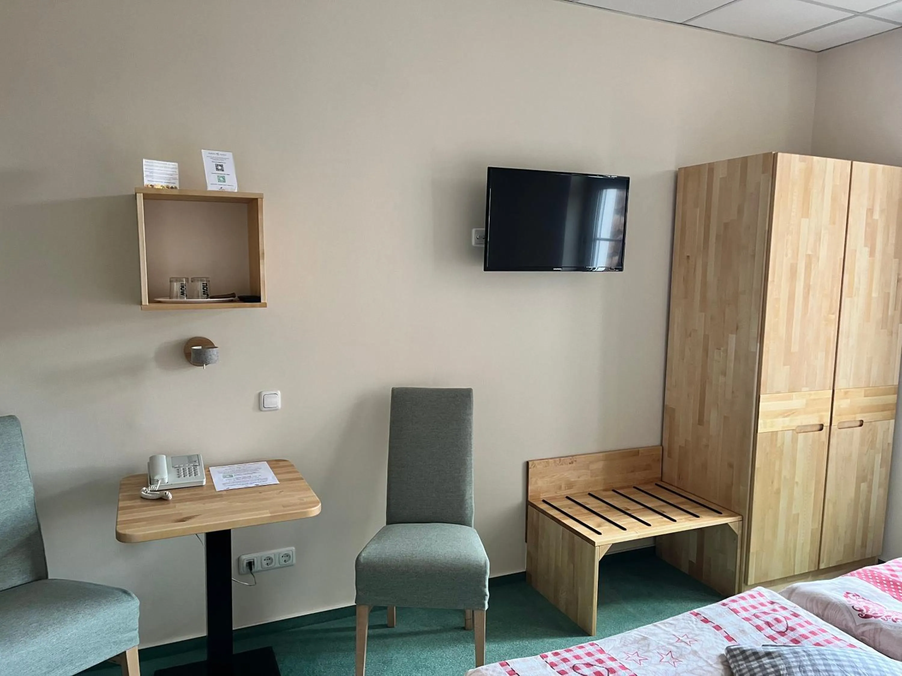 Photo of the whole room, Bed in Biohotel Amadeus