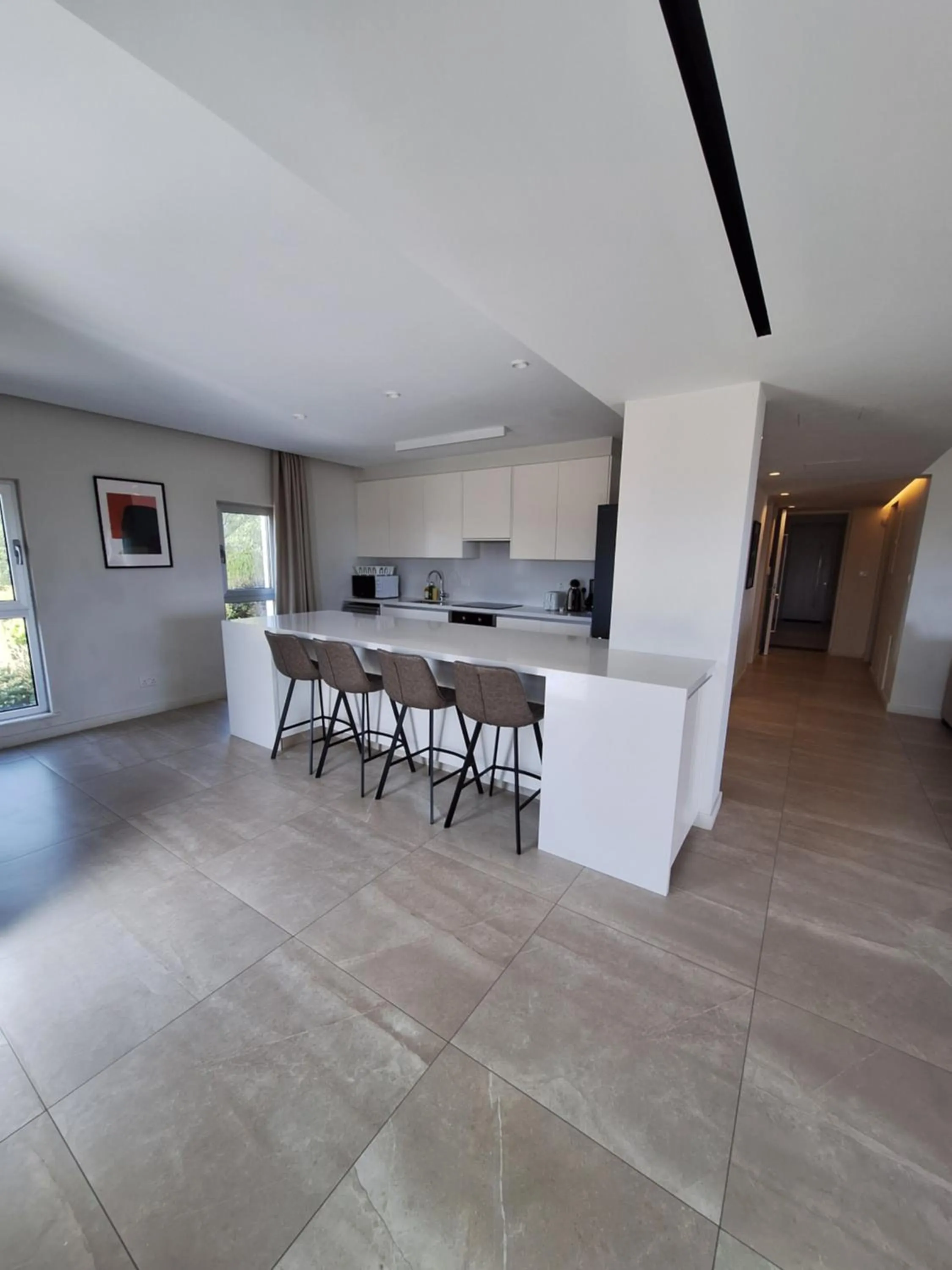 Kitchen or kitchenette in Emerald Suites