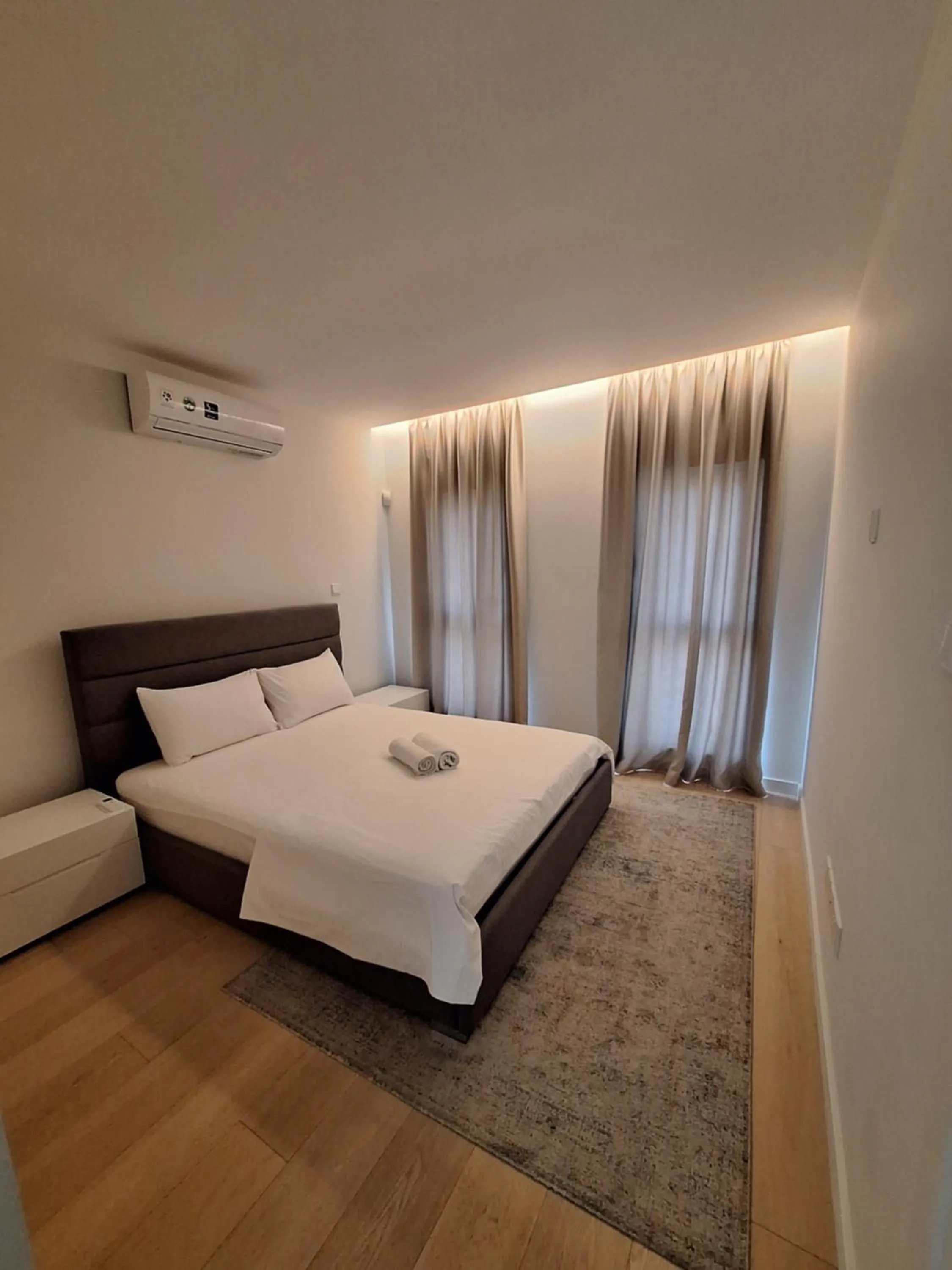 Bed in Emerald Suites