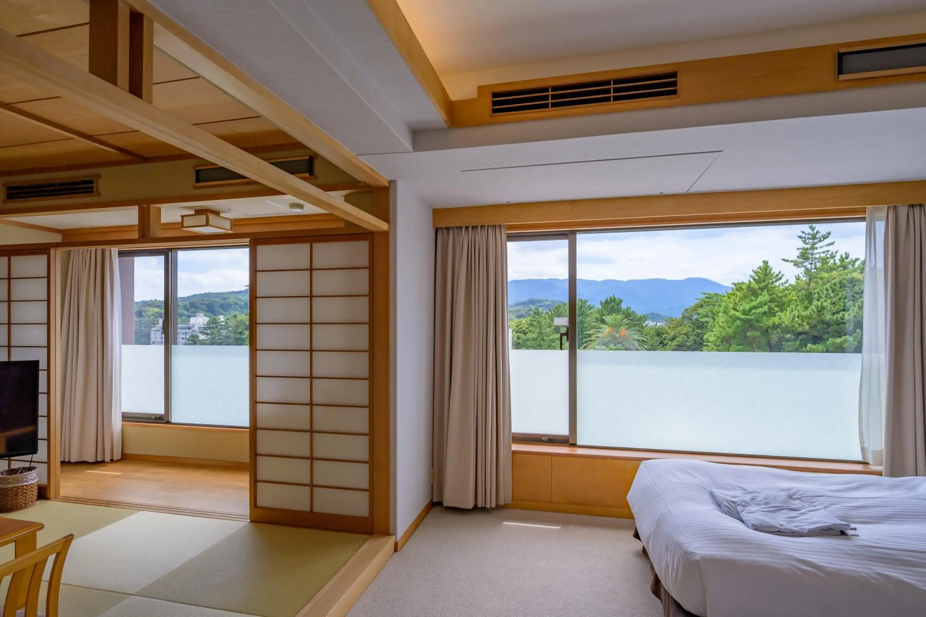 View (from property/room), Bed in Toba International Hotel