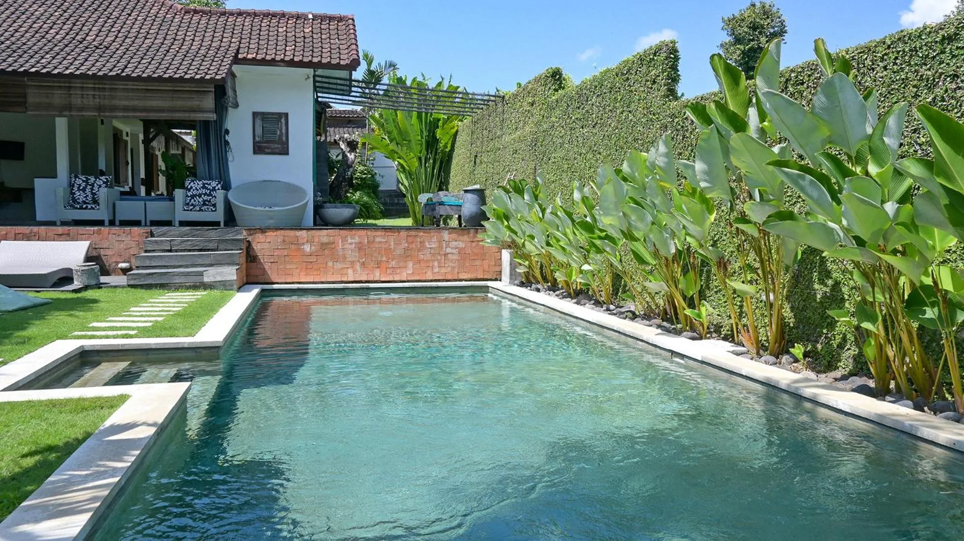 Swimming pool in Villa Bumi - Playful & Quirky 3BR Villa Near Seminyak, a Unique Getaway
