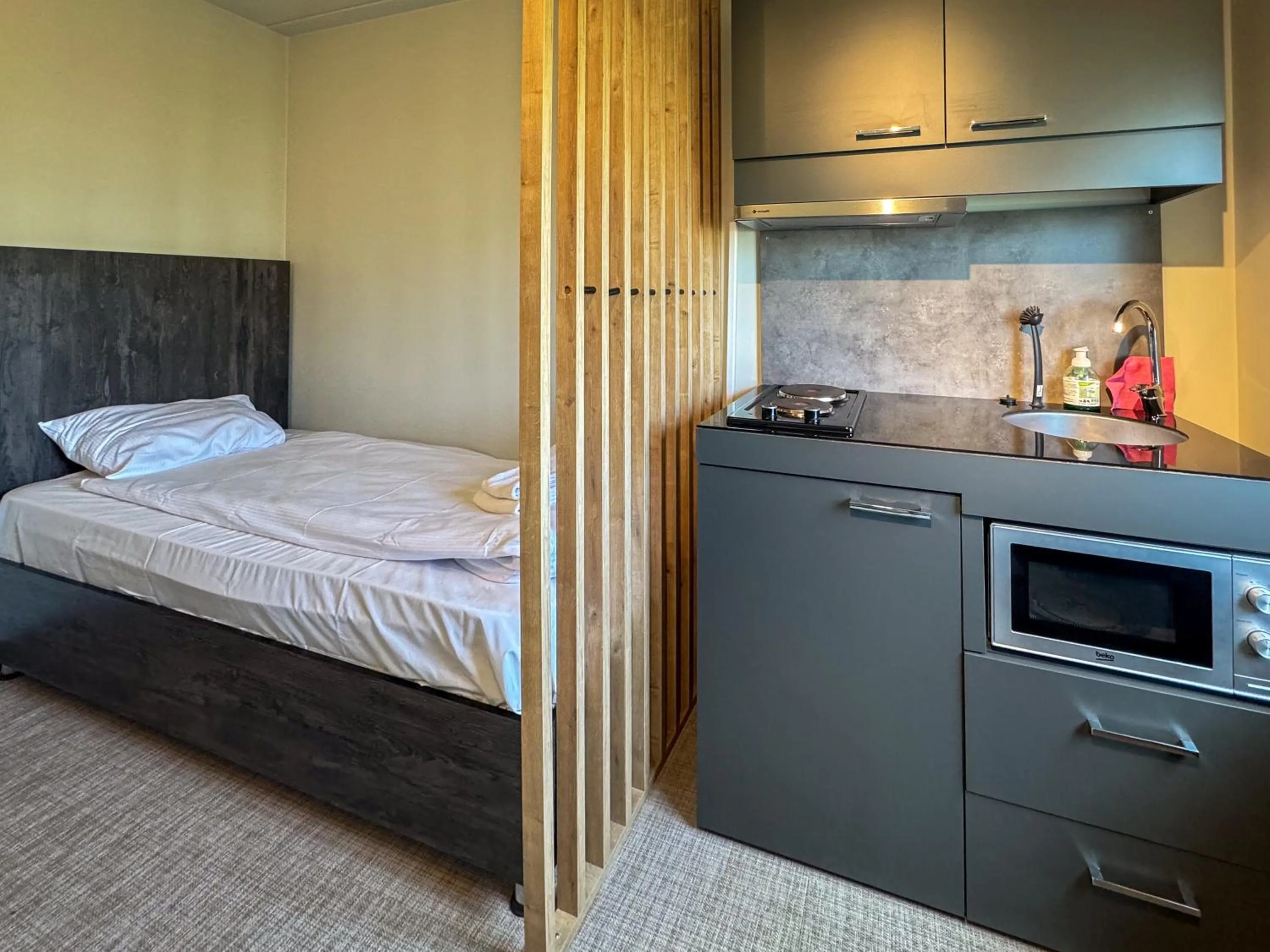 Bed in Jönköping Hotel Apartments