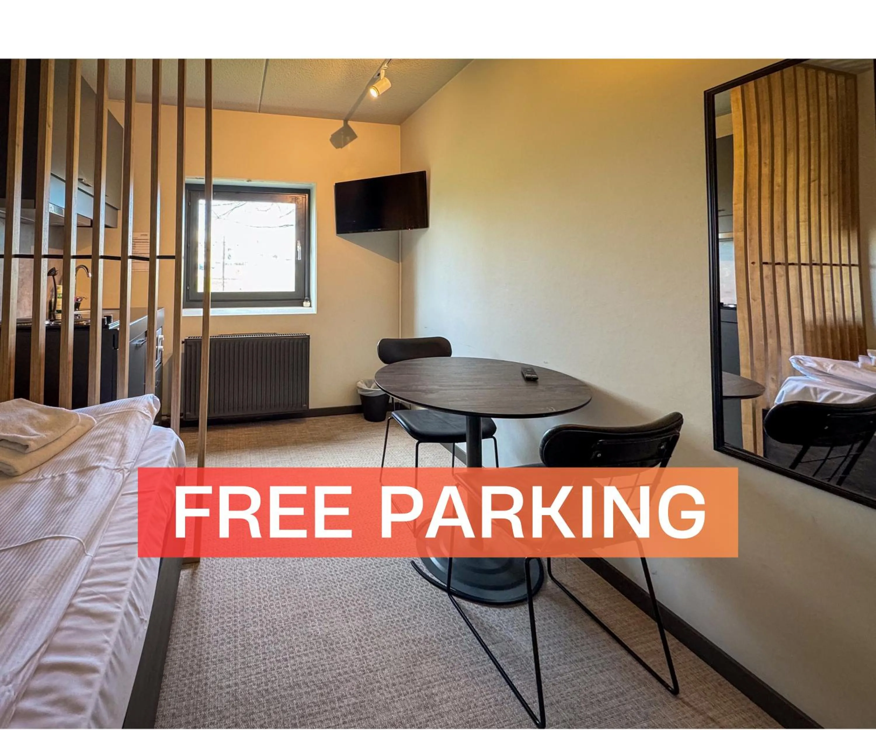 TV and multimedia, Bed in Jönköping Hotel Apartments