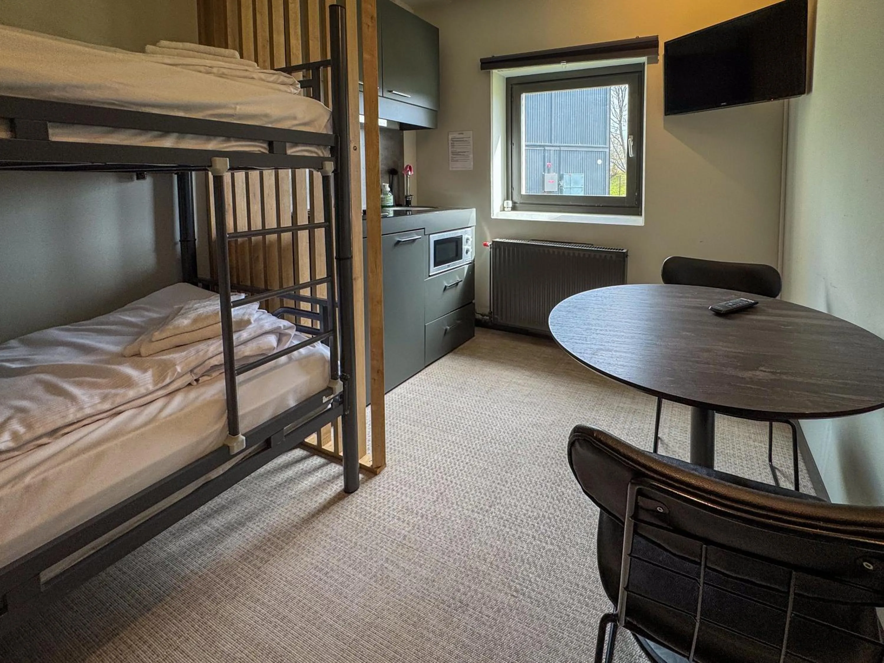 TV and multimedia, Bed in Jönköping Hotel Apartments