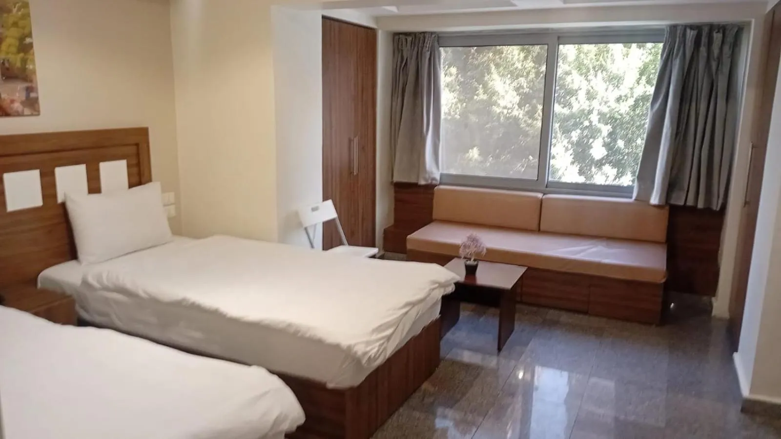 Bed in Royal Inn Residence