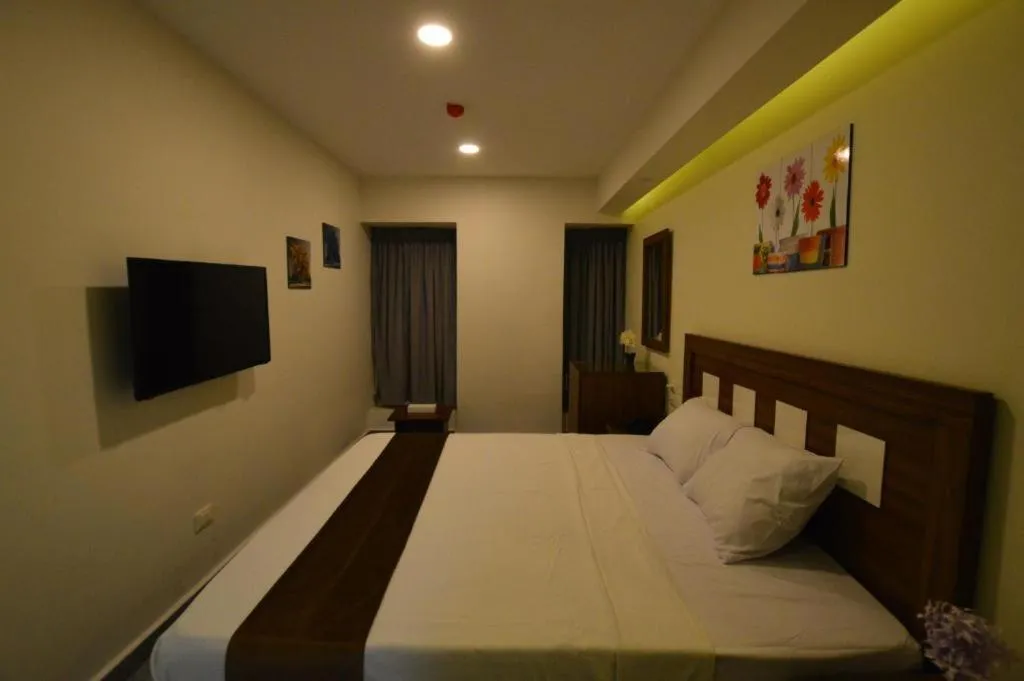 Bed in Royal Inn Residence