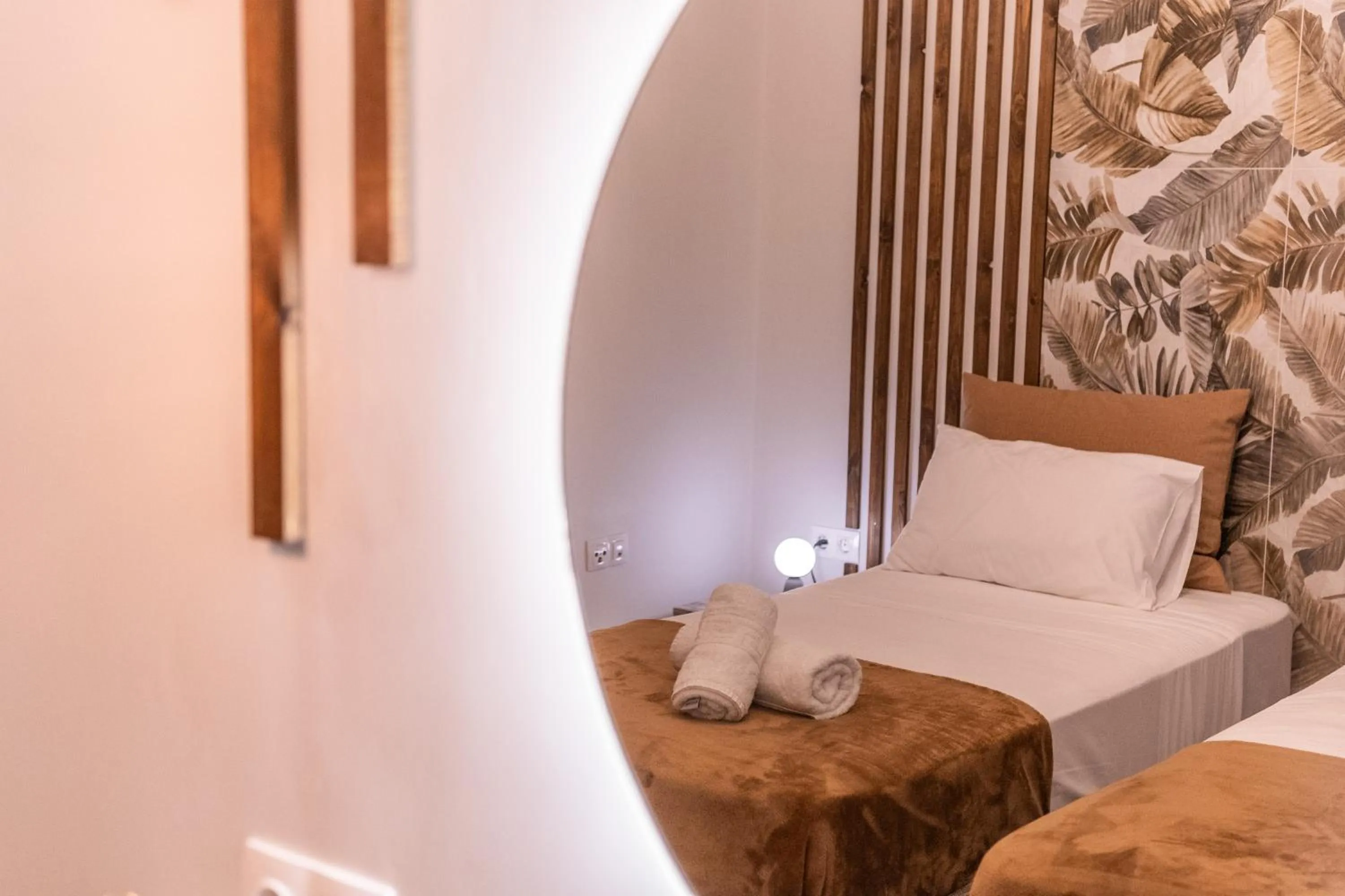 Bed in Semiso Beach Suites