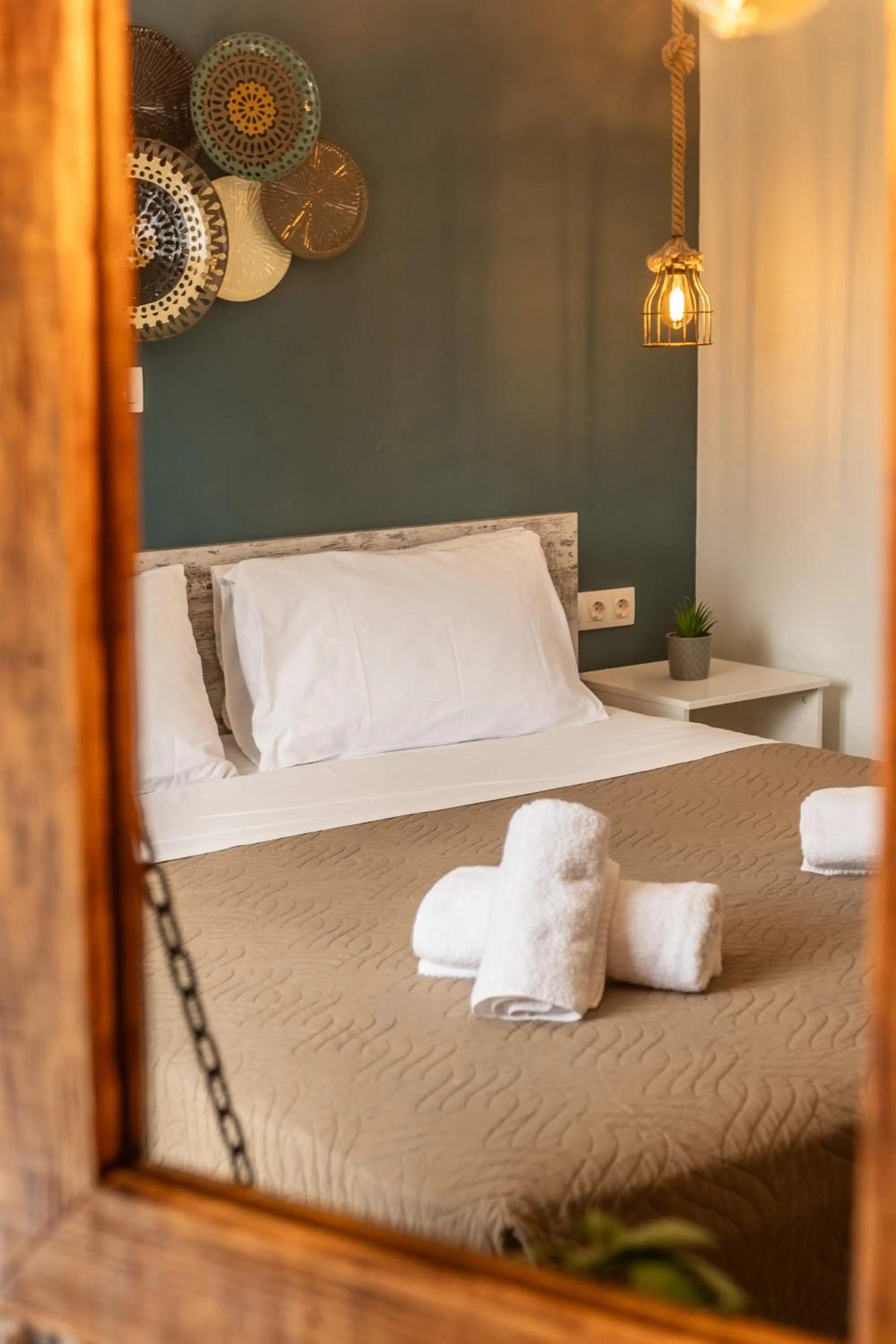 Bed in Semiso Beach Suites