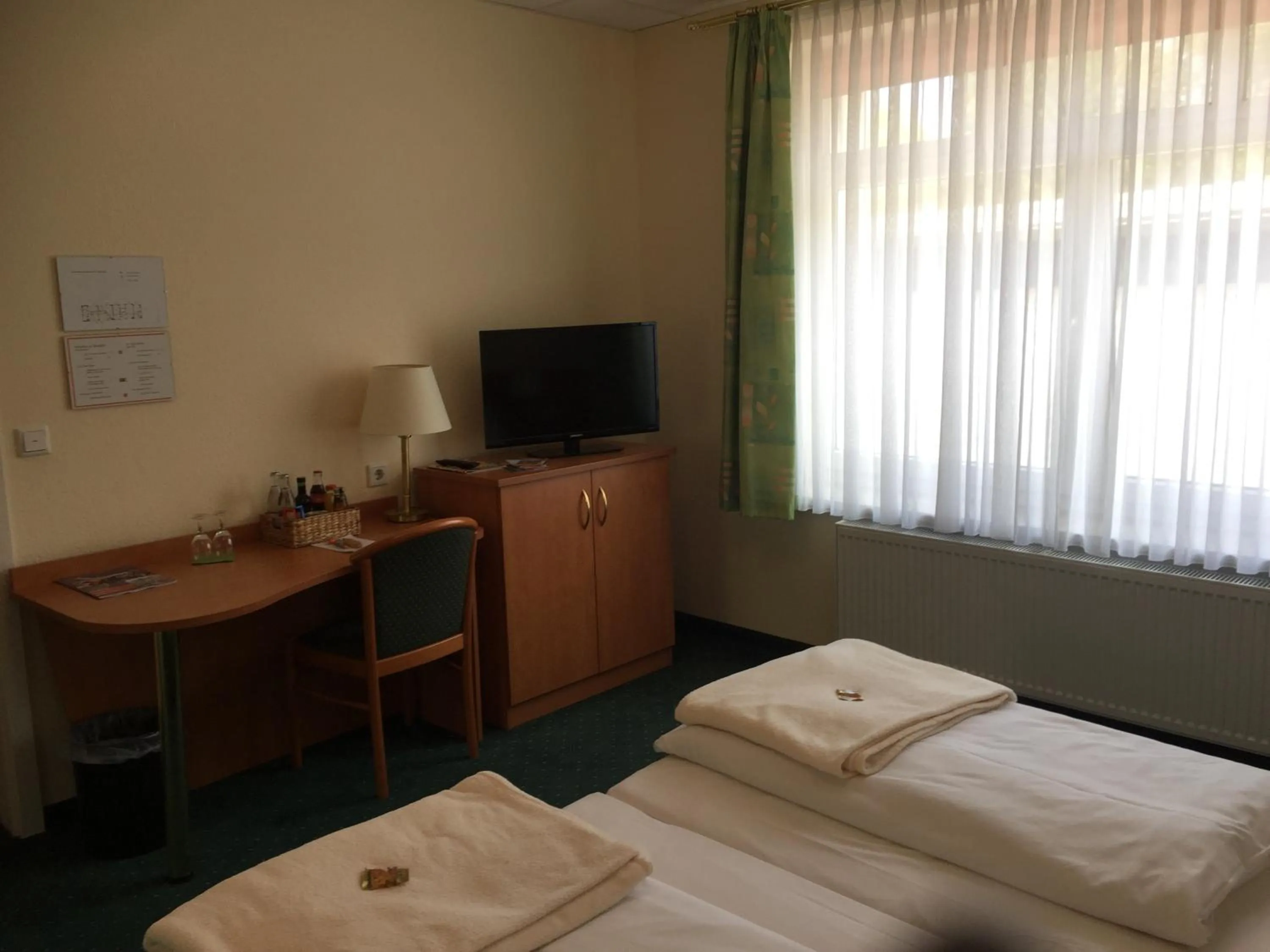 Decorative detail, TV/Entertainment Center in Frick's Hotel