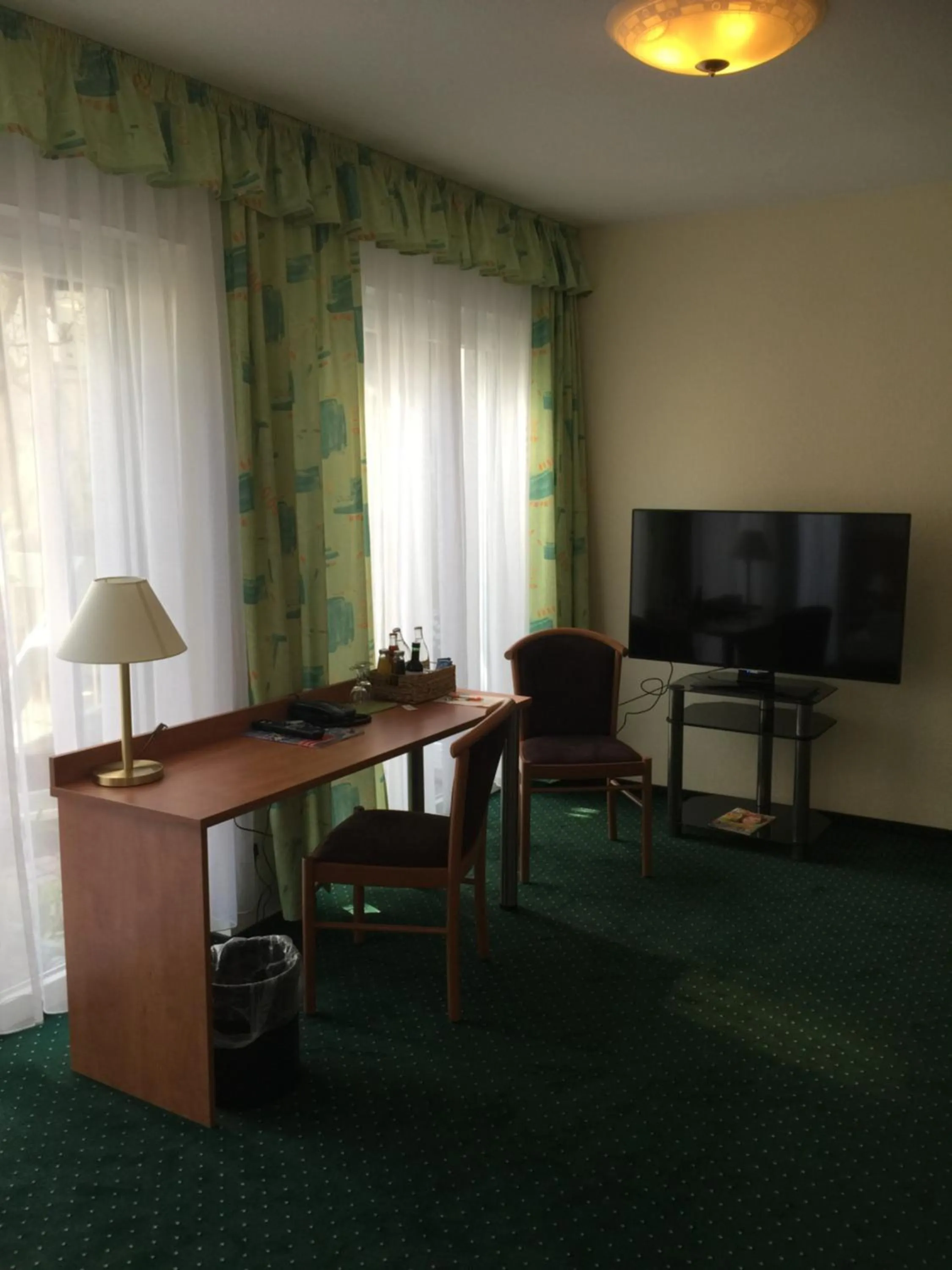 Decorative detail, TV/Entertainment Center in Frick's Hotel