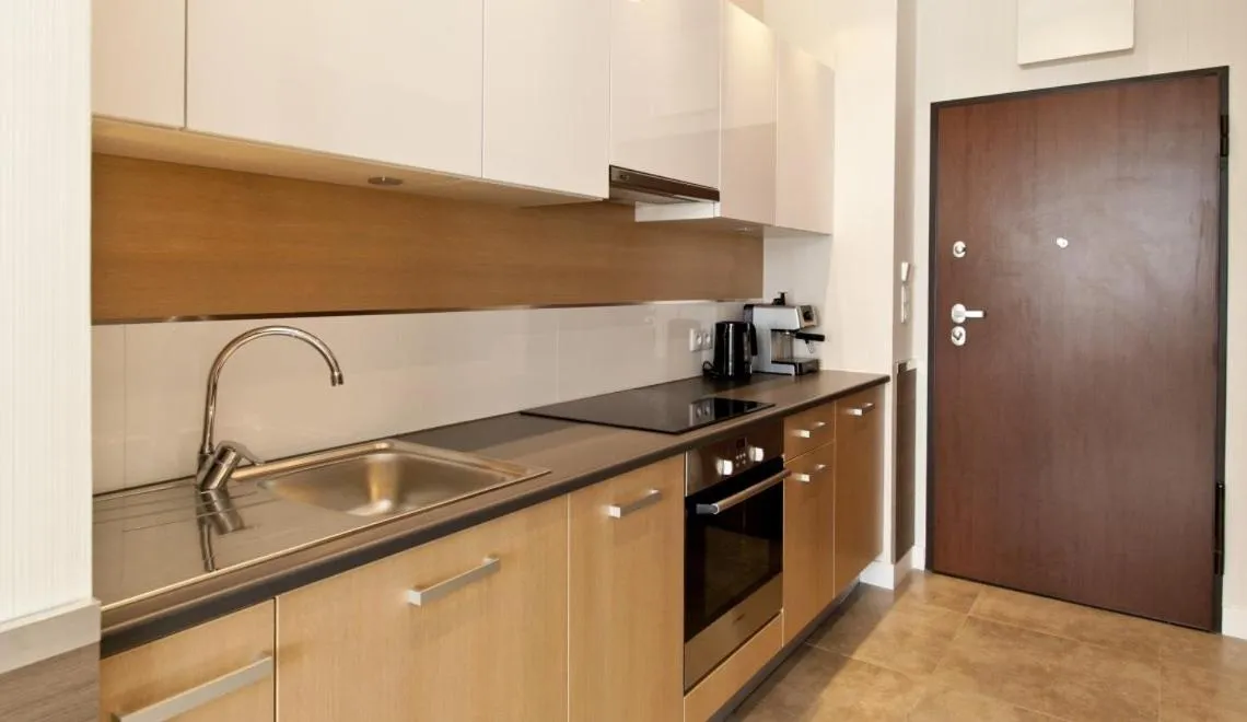 Kitchen or kitchenette in Dune Resort Mielno - A