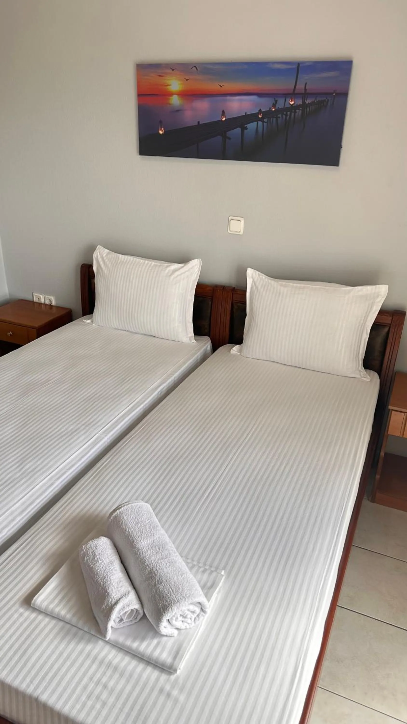 Bed in Artemis Hotel Apartments