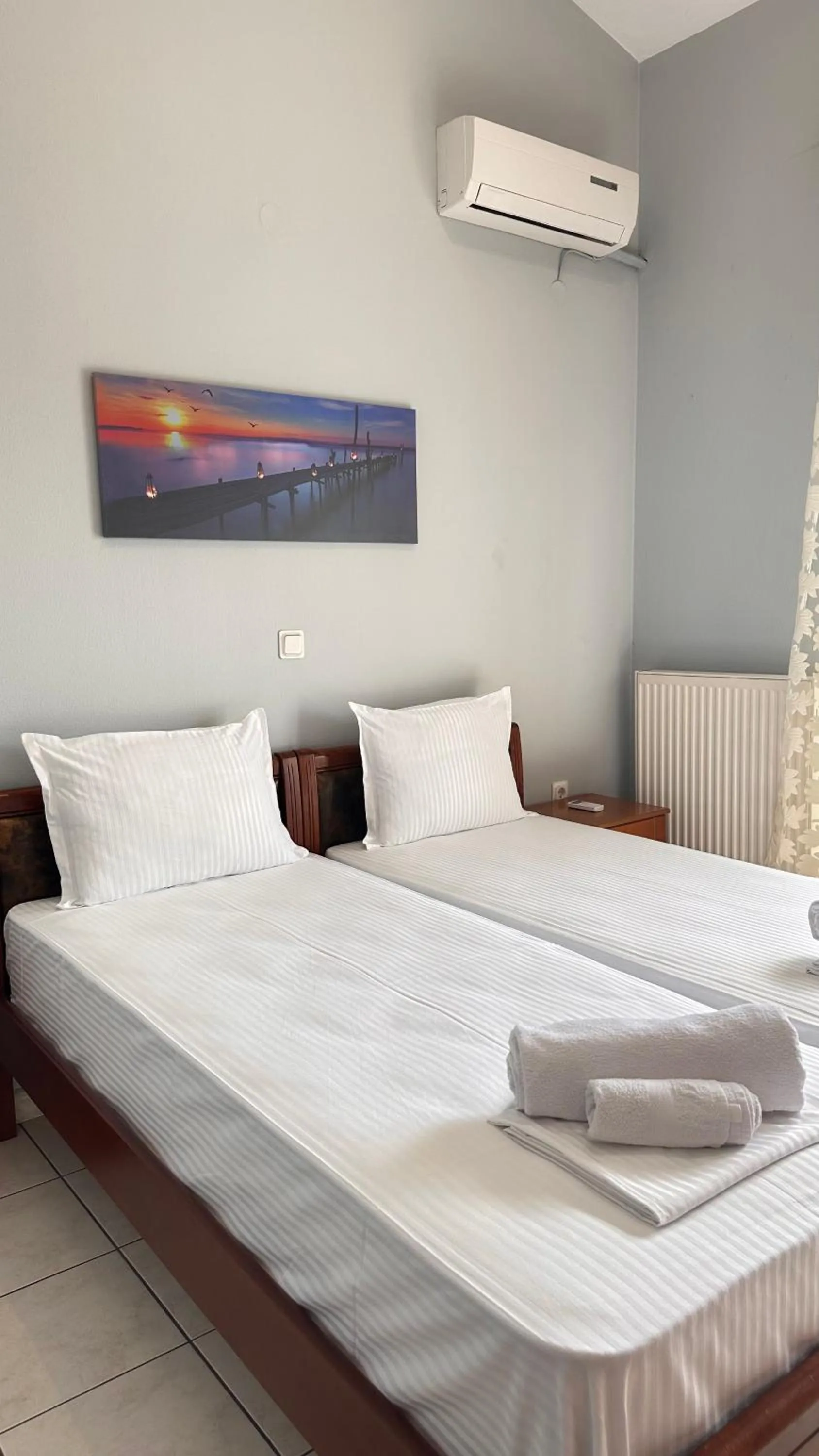 Bed in Artemis Hotel Apartments