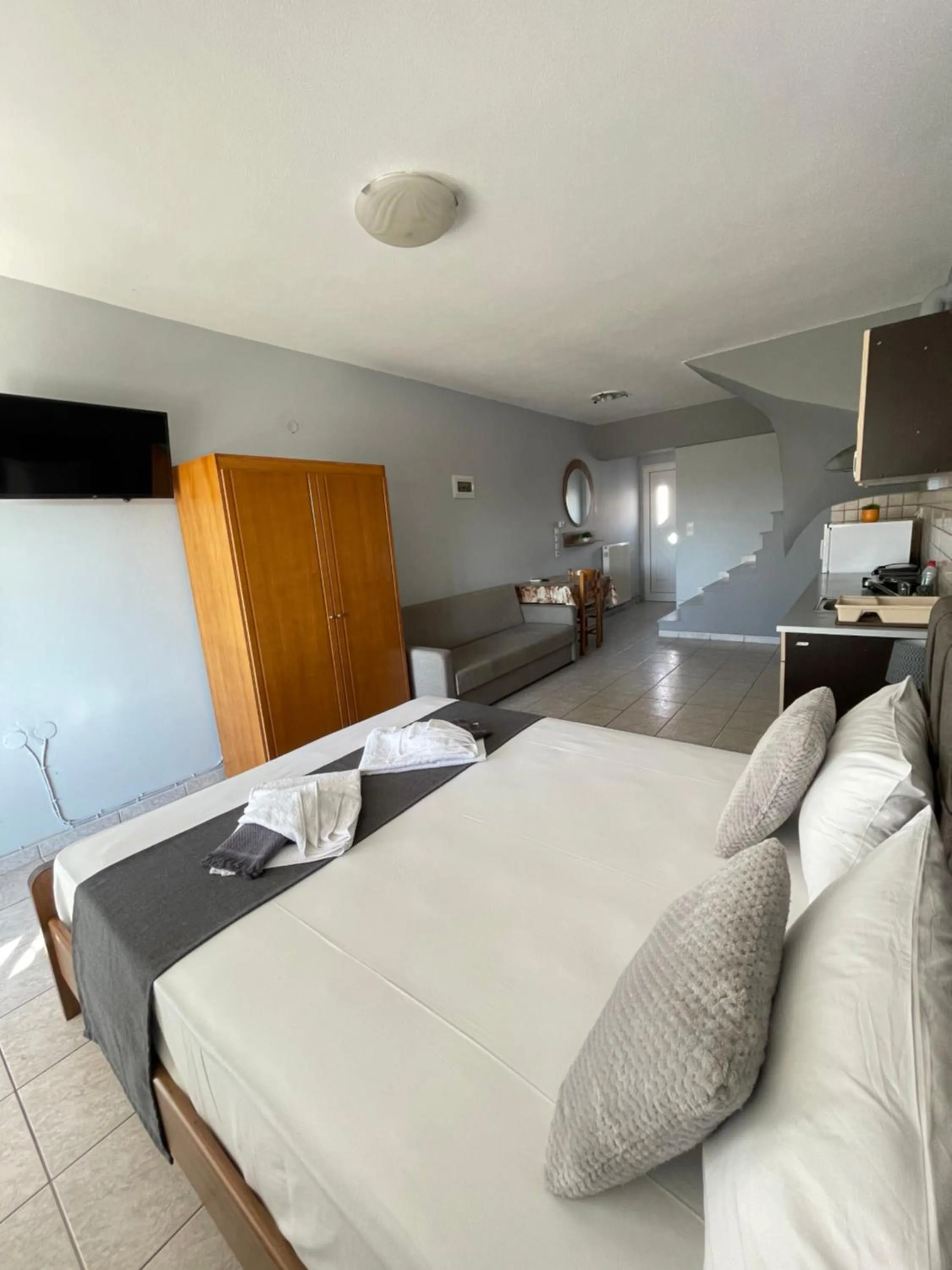 Bed in Artemis Hotel Apartments