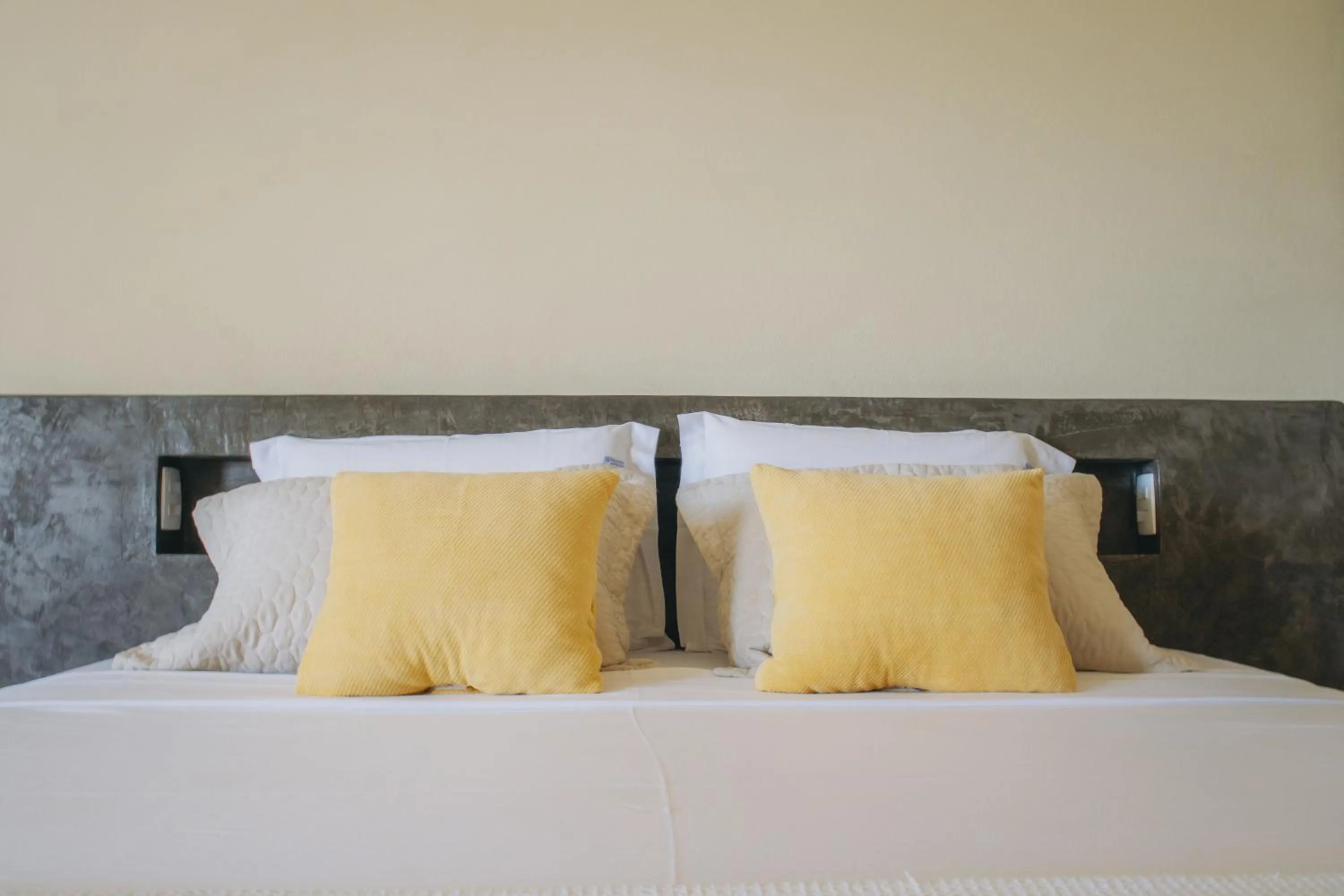 Bed in Dolce Vita Guest House