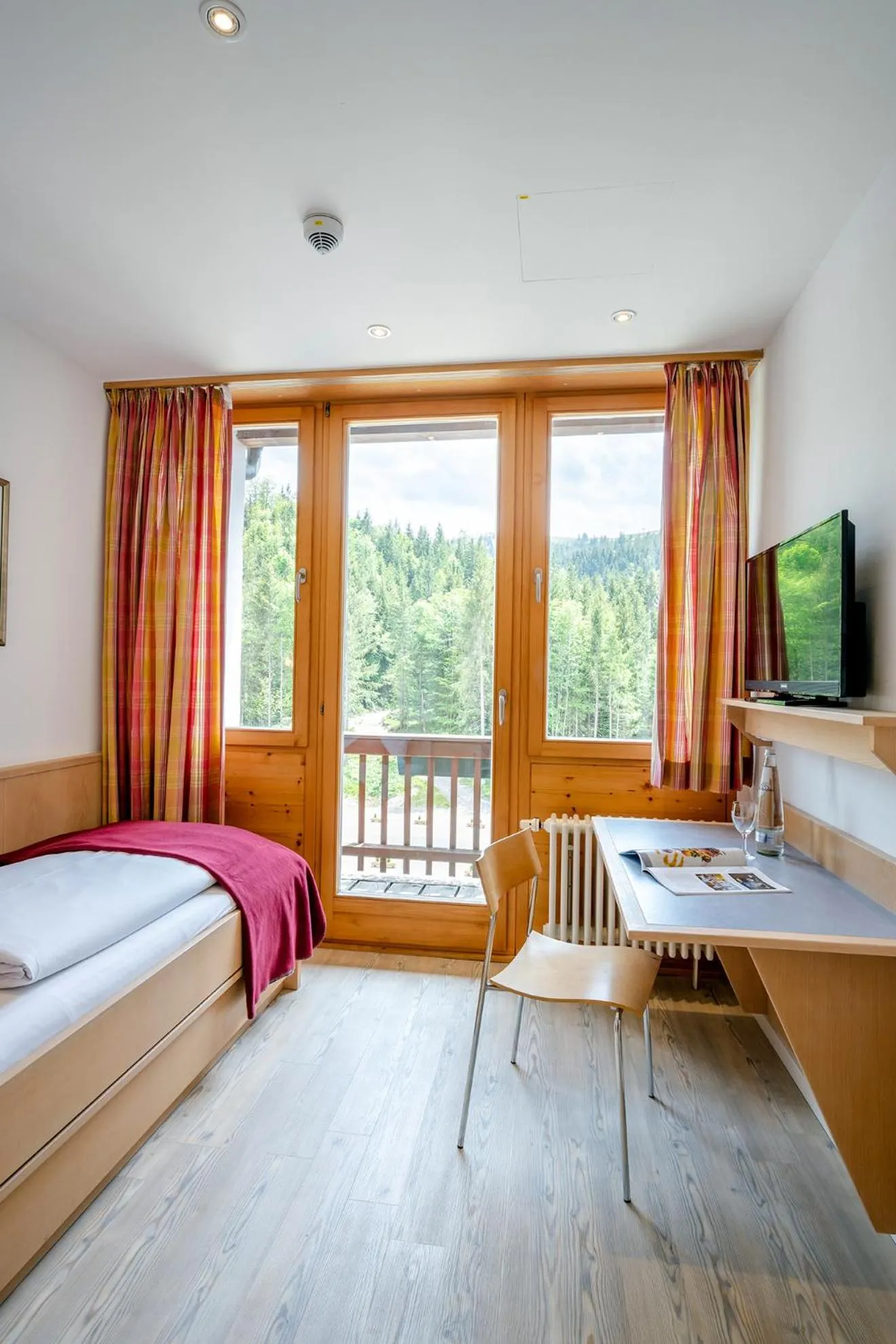 Photo of the whole room, Bed in Berghotel Sudelfeld