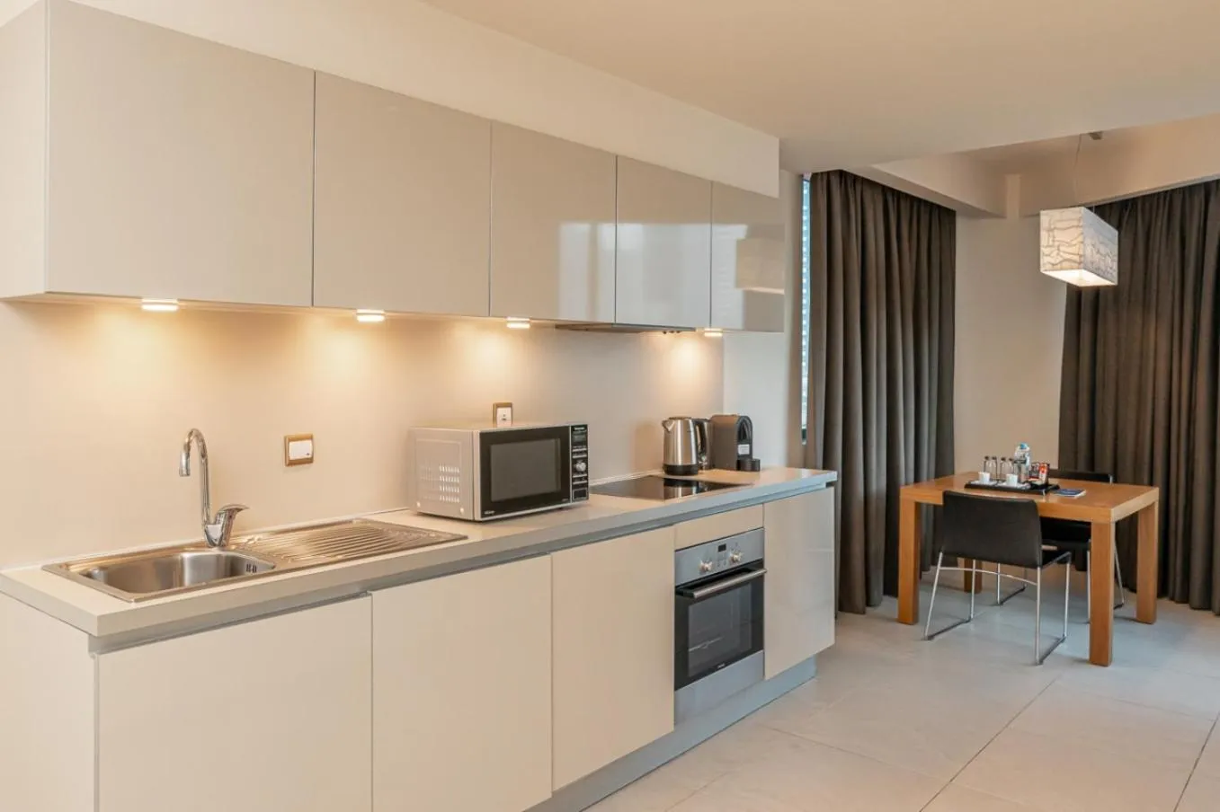 Kitchen or kitchenette in Radisson Blu Residence, Dubai Marina
