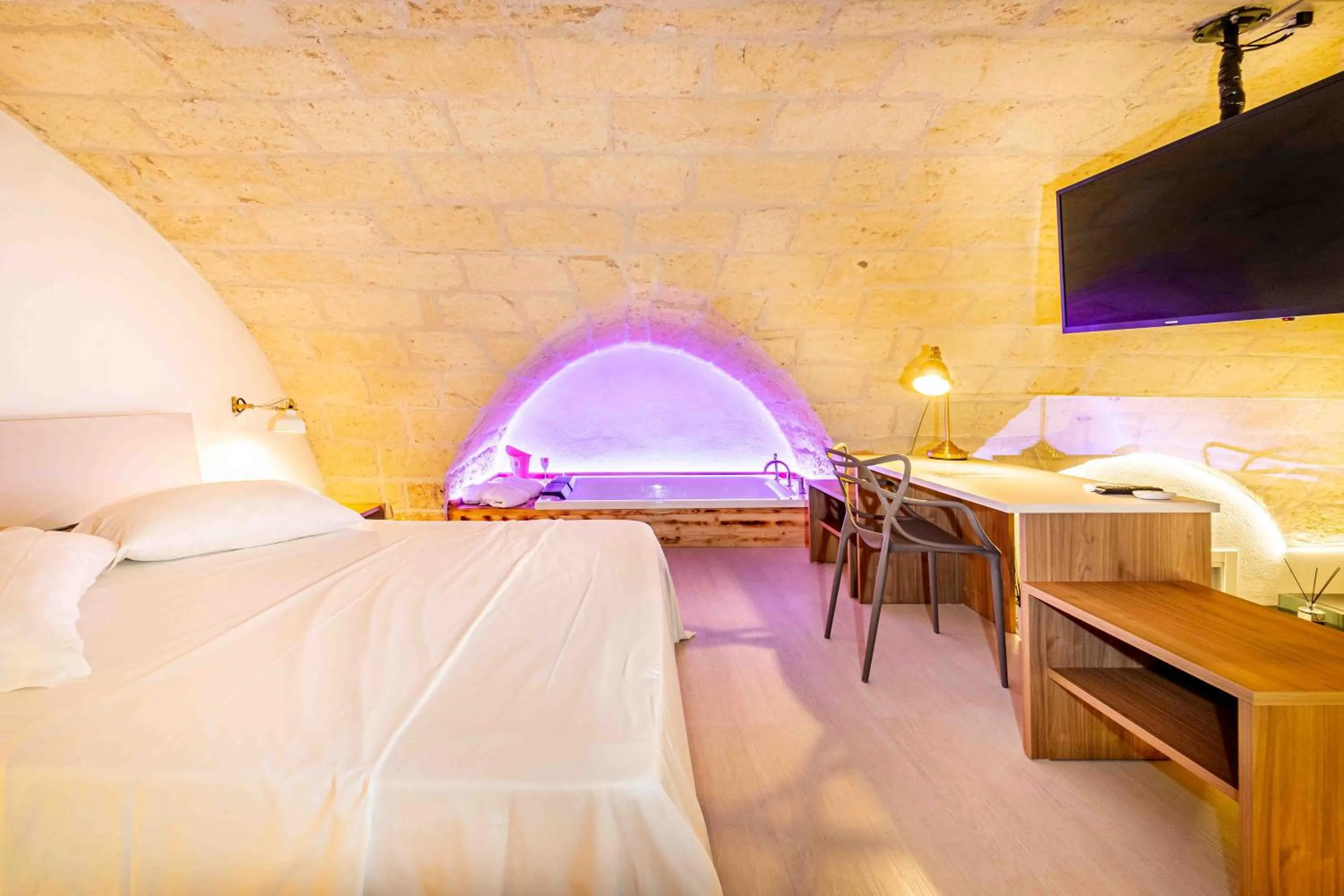 Bed in Il Melograno - Suite Deluxe