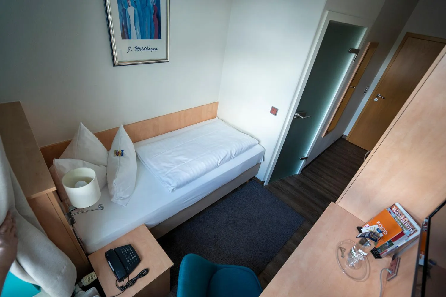 Bed in Hotel Stadt Lüdenscheid