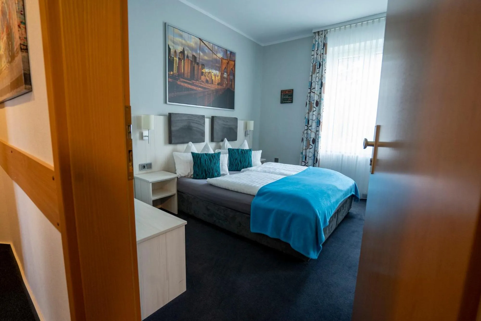 Bed in Hotel Stadt Lüdenscheid