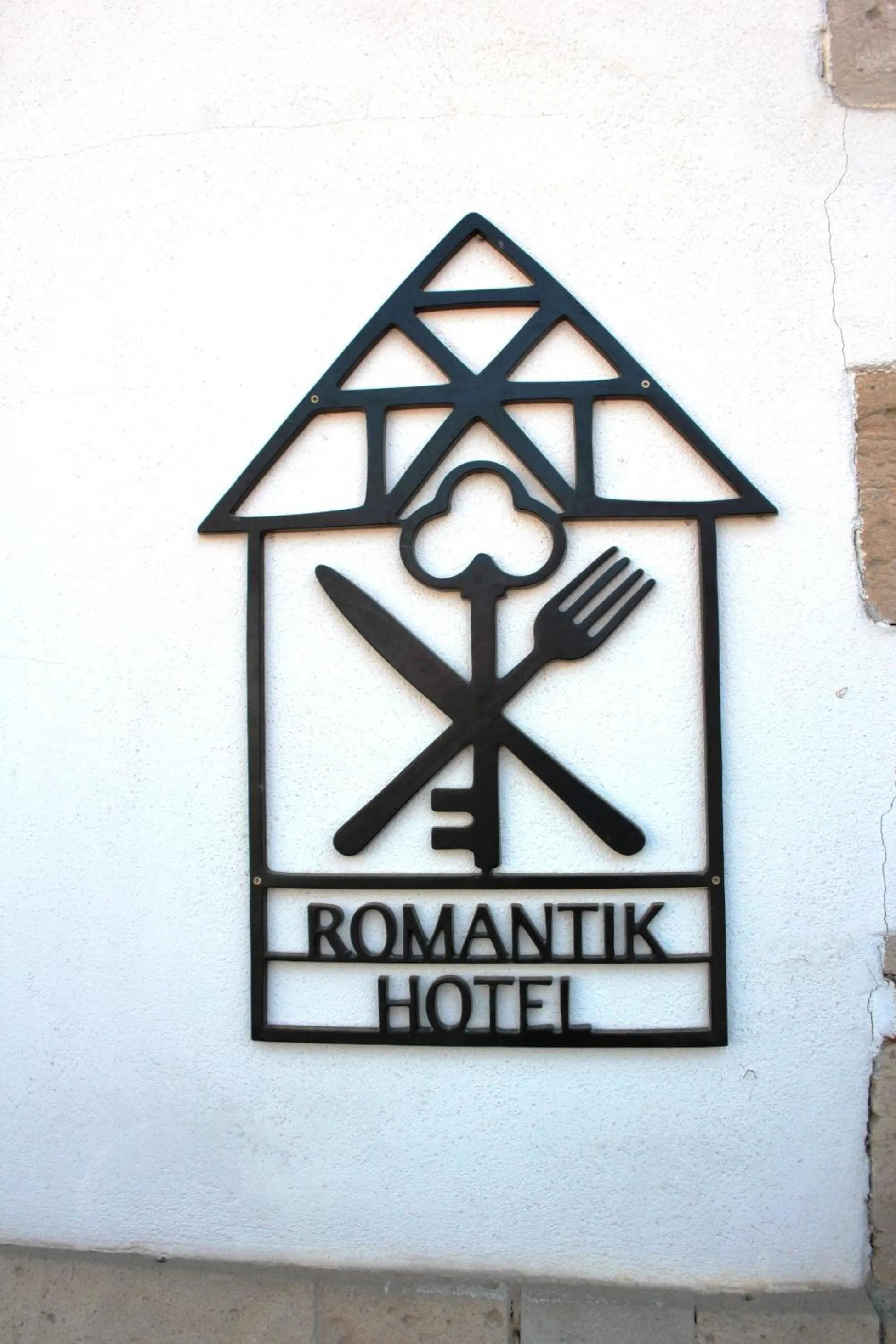 Property logo or sign in Romantik Hotel Zum Rosenhof
