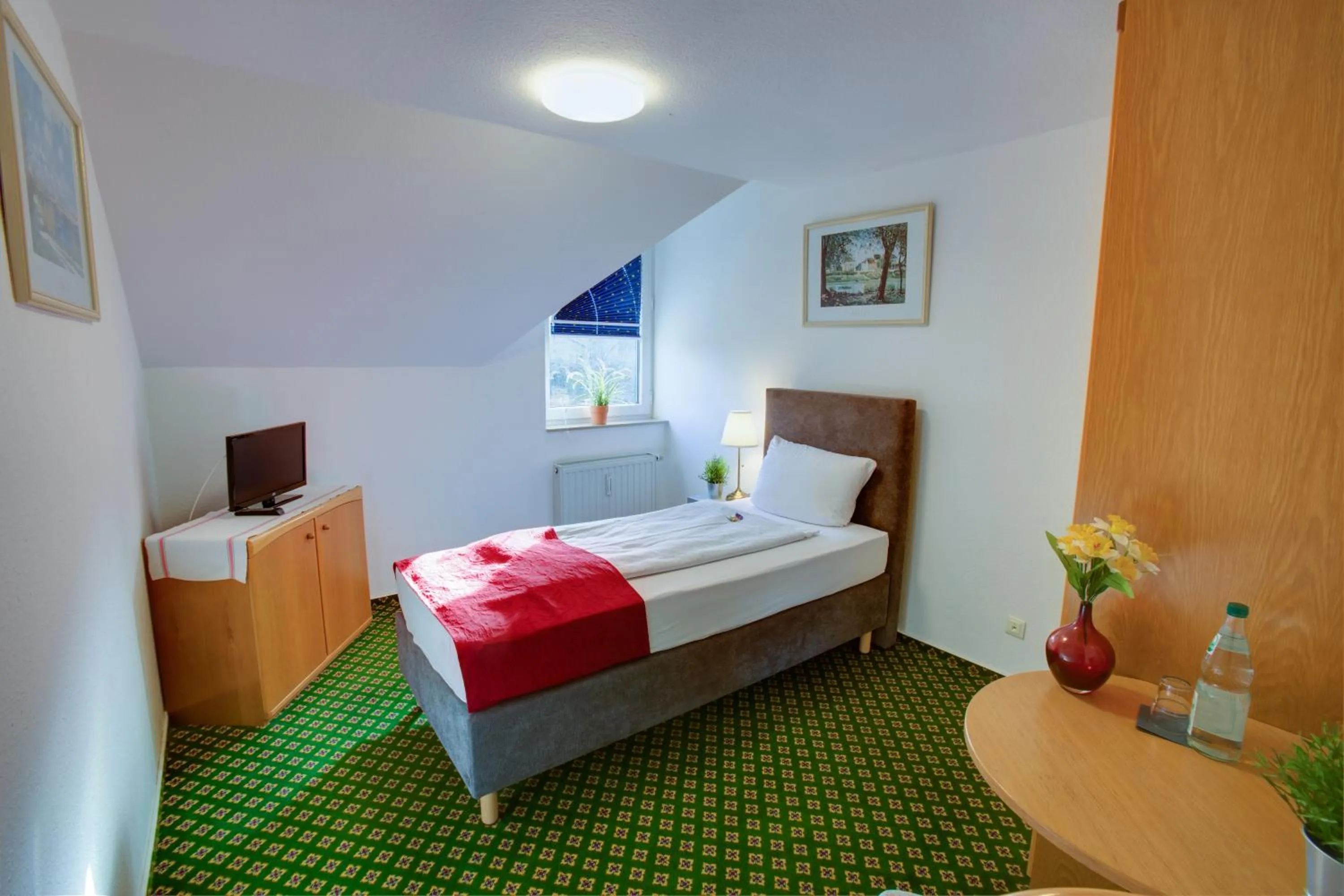 Bed in Hotel Leo Mühlhausen