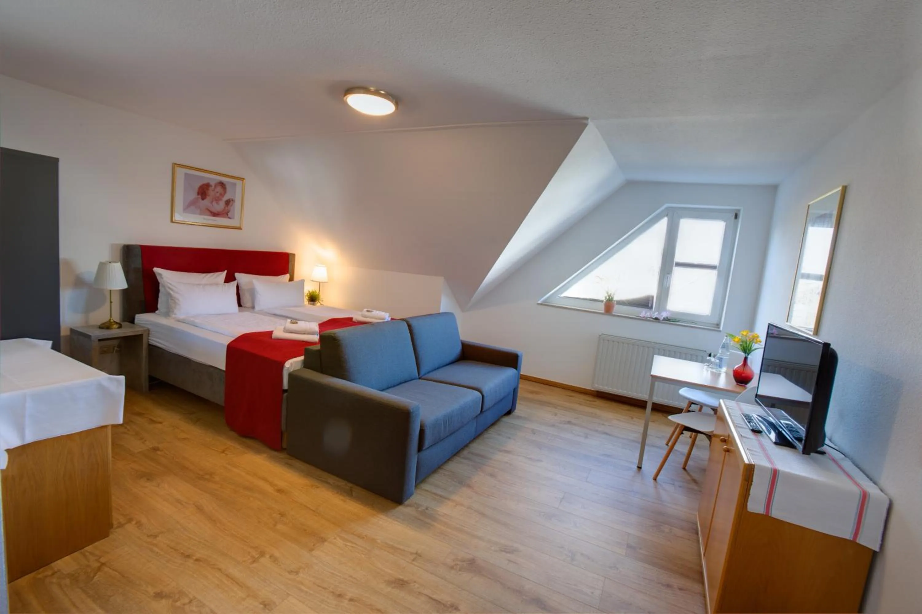 Bed in Hotel Leo Mühlhausen