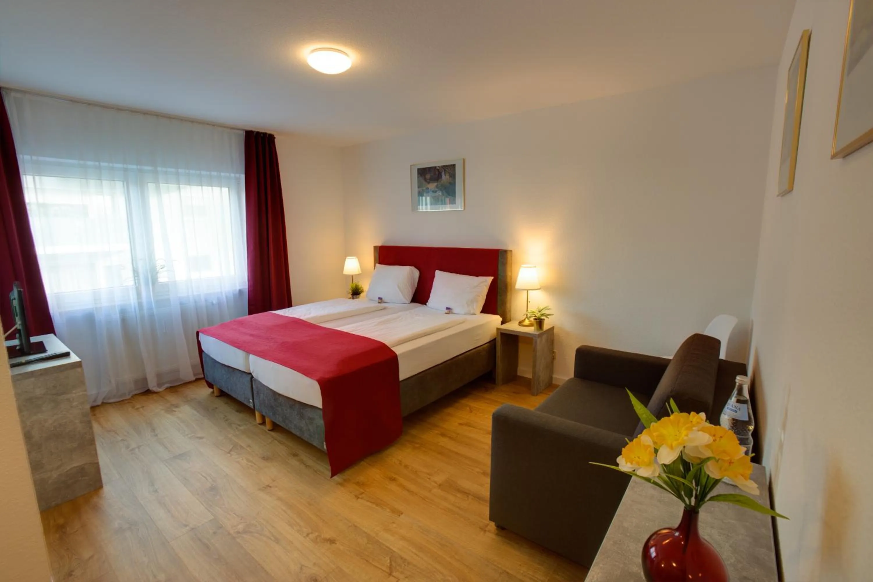 Bed in Hotel Leo Mühlhausen