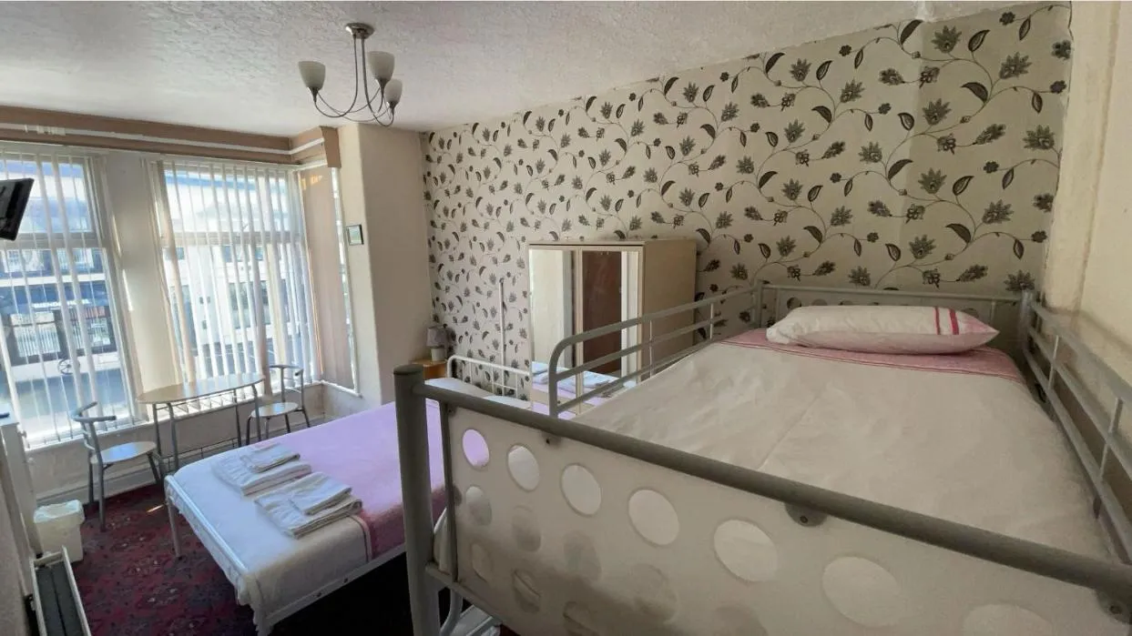 Family, Bed in White Moon Hotel