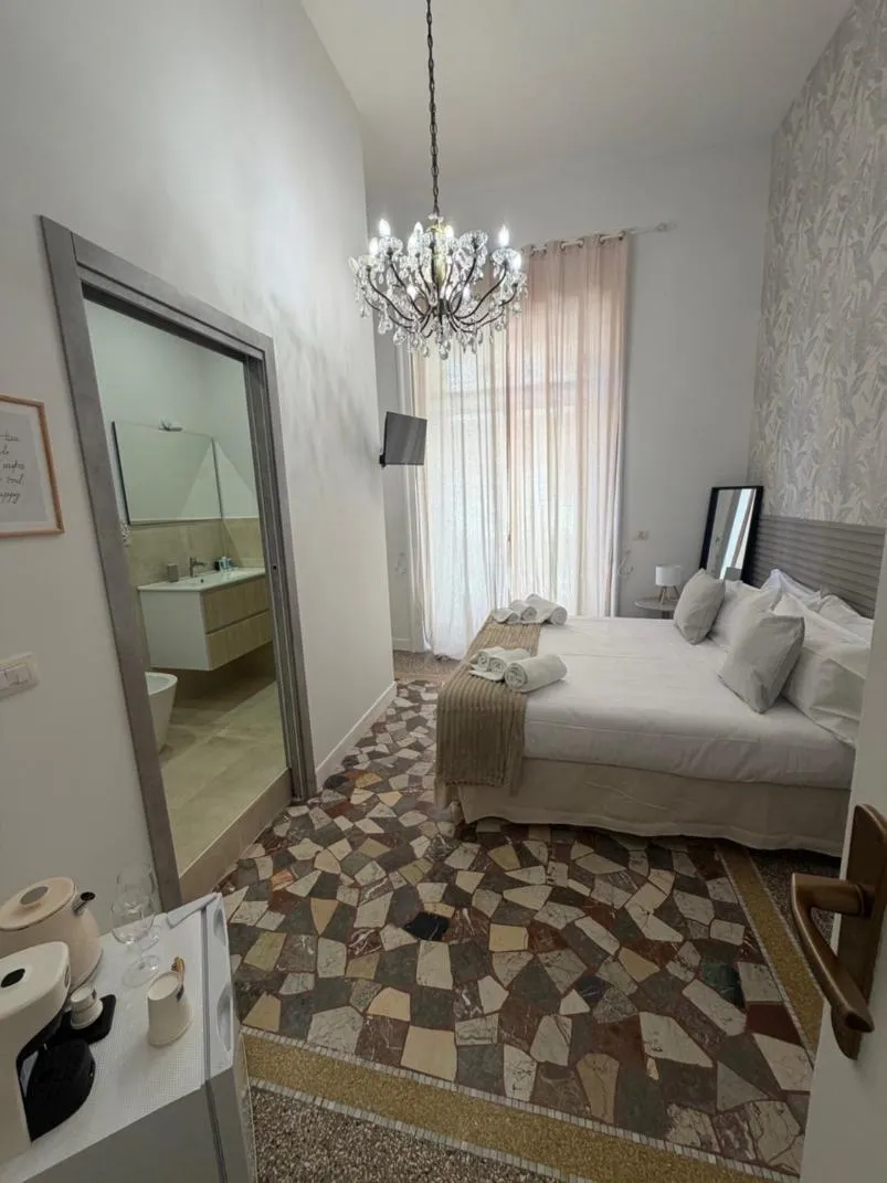 Bed in Joy's Rooms Ortigia