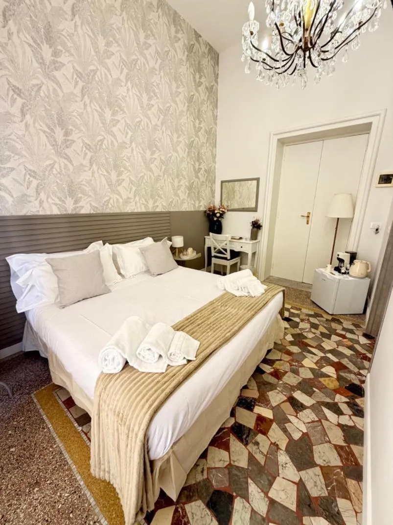 Bed in Joy's Rooms Ortigia