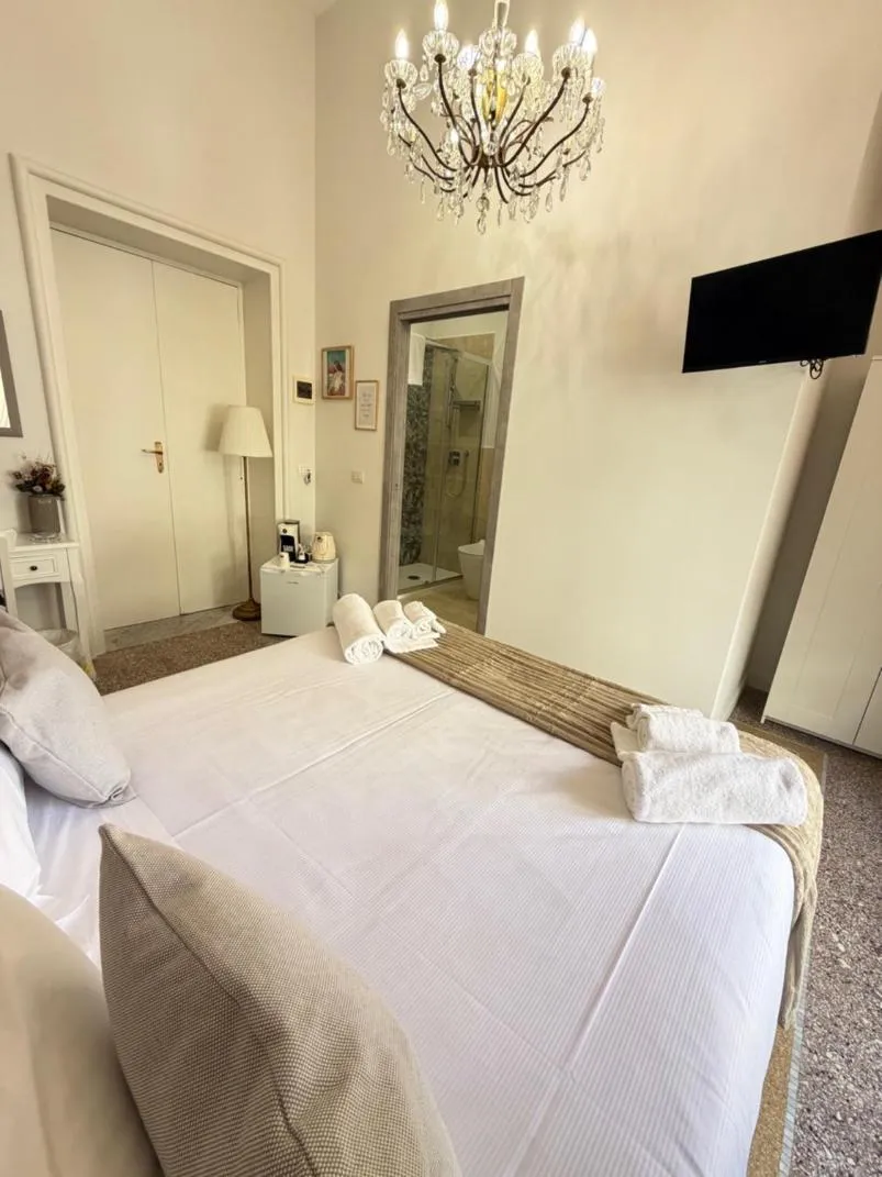 Bed in Joy's Rooms Ortigia