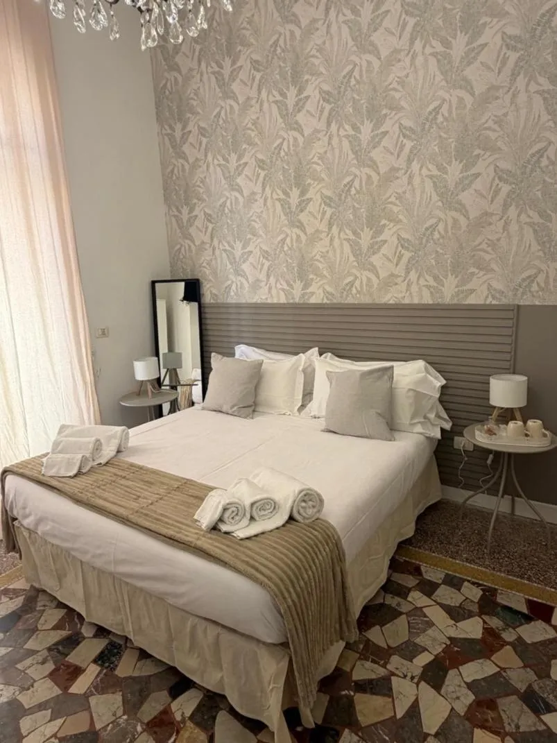 Bed in Joy's Rooms Ortigia