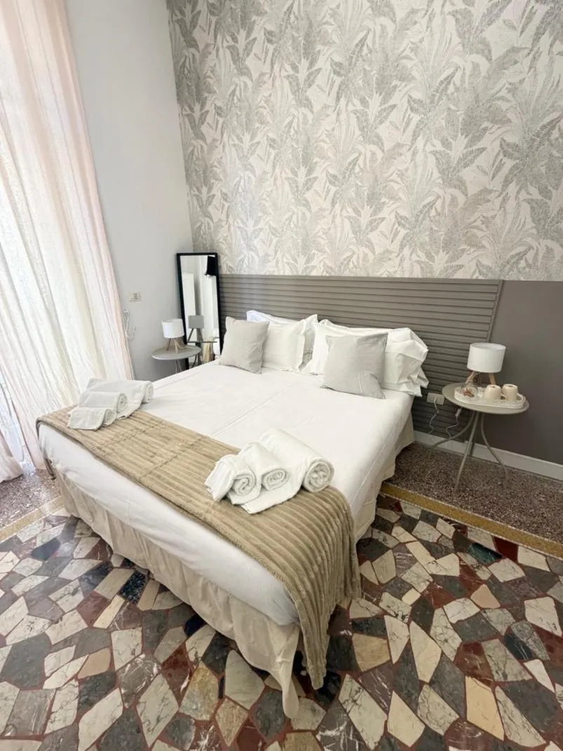 Bed in Joy's Rooms Ortigia