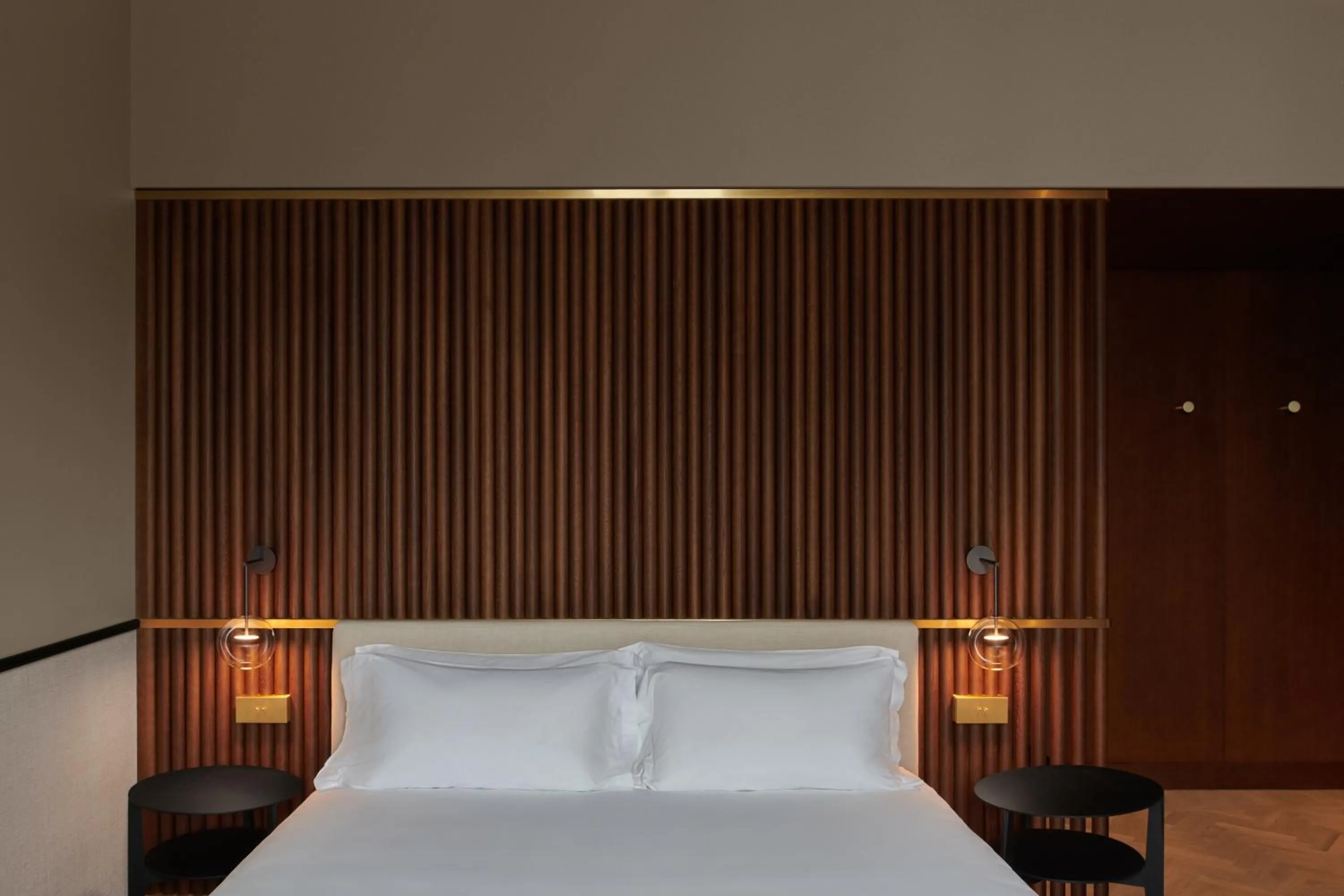 Bed in Amabilia Suites