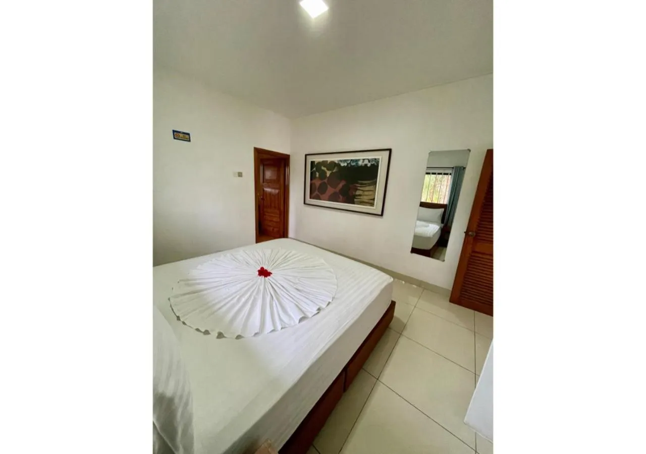 Bedroom, Bed in Anse Soleil Resort